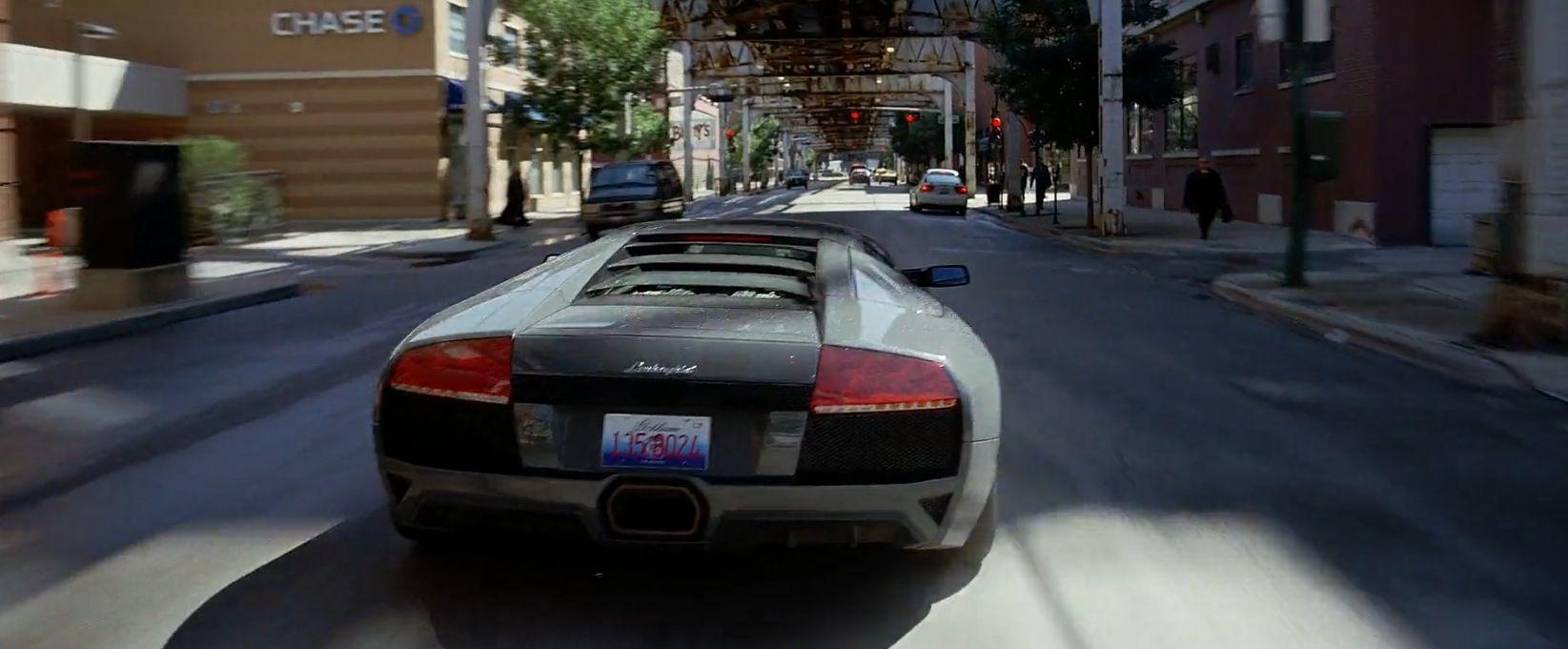 Lamborghini murcielago lp640 driving down city street