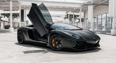 Avoiding Curveballs When Buying Your First (Or Next) Lamborghini 2 Lamborghini aventador with the iconic scissor doors
