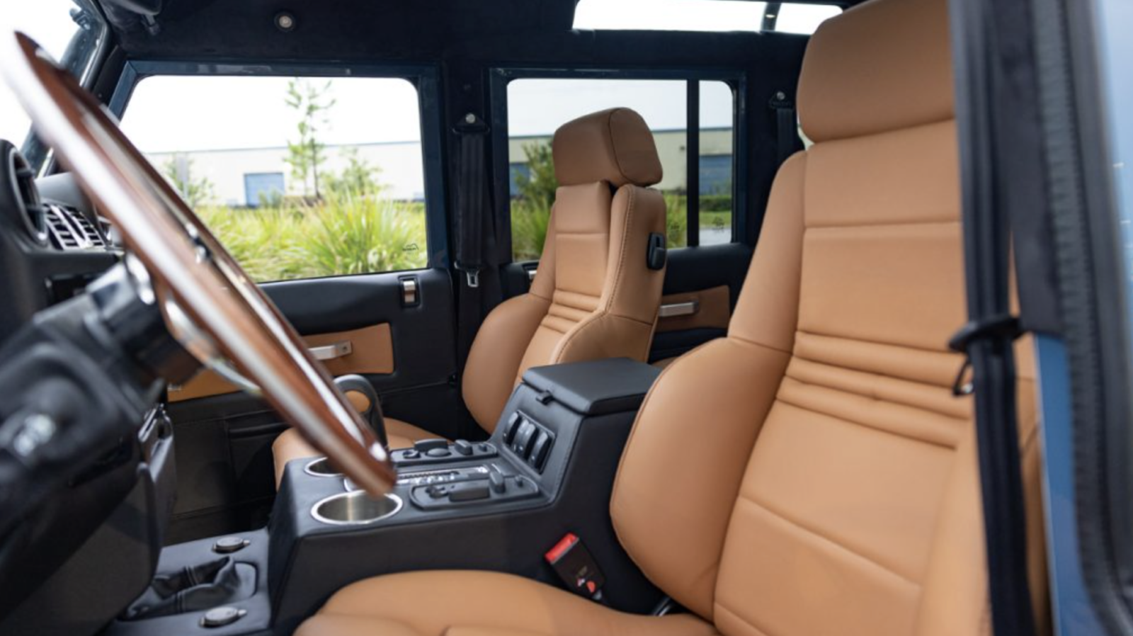 Reimagining Rugged Elegance: Land Rover Defenders Reborn In Lamborghini Hues 5 1993 land rover defender 110 (nas): upgraded with lamborghini olympus leather seats