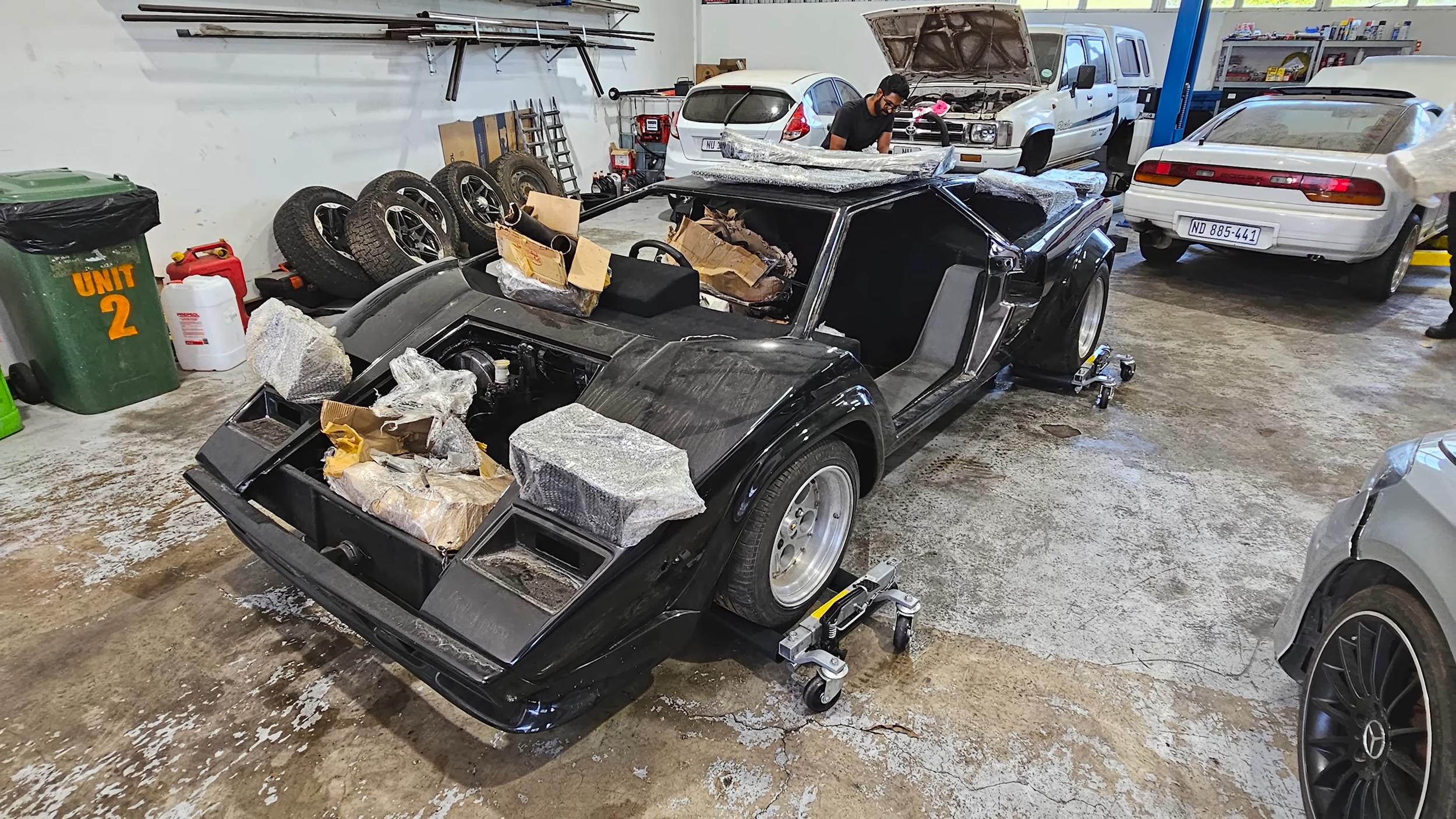 Blasphemy Or Brilliance? Unique Toyota V12-Swapped Lamborghini Countach Clone Sparks Debate! 2 Vs youtube buildingalamborghinicountachreplicawithatoyota1gz fev12 episode2enginetransaxle 134