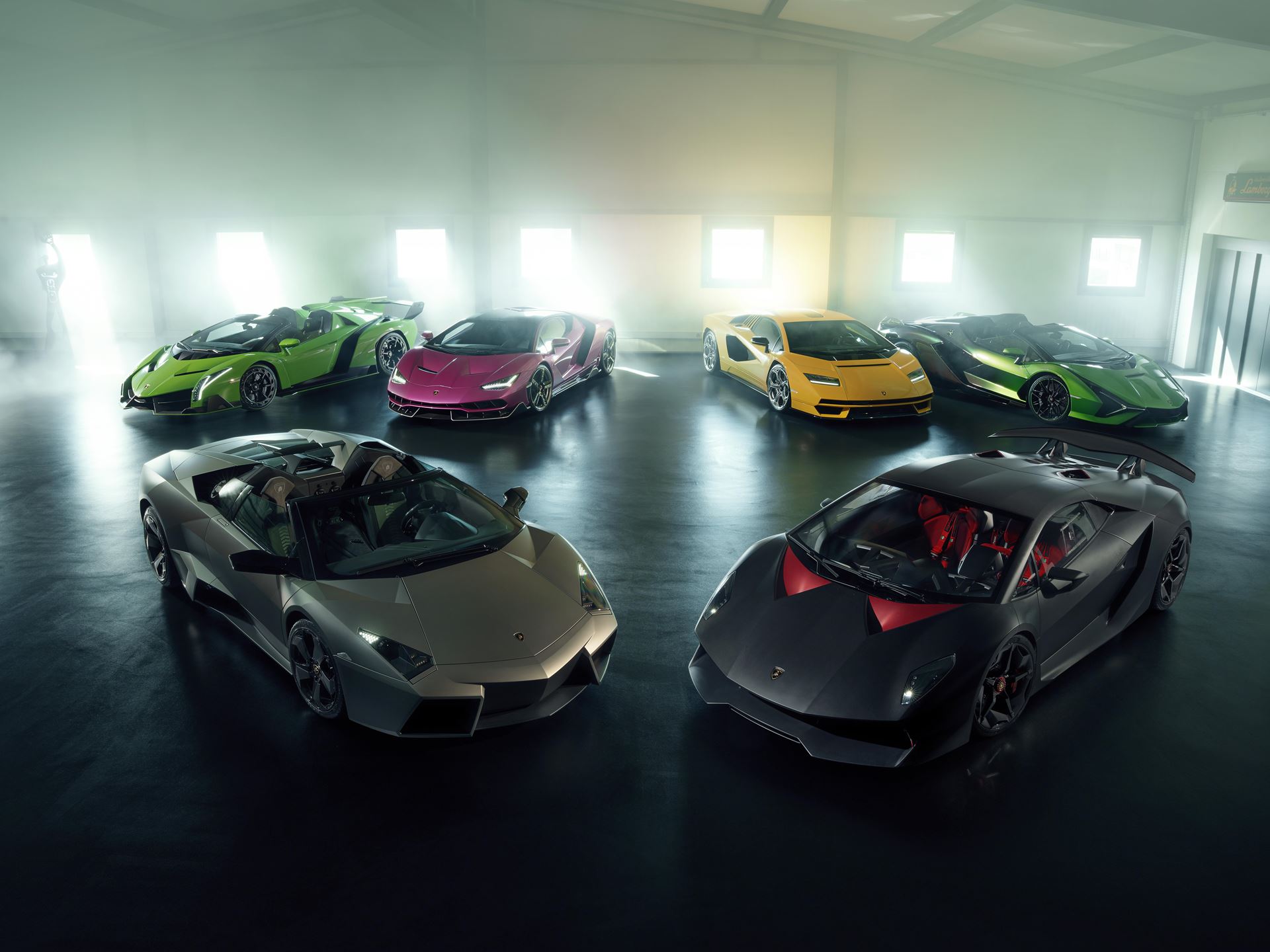 Multiple hypercars exterior wide shot 001
