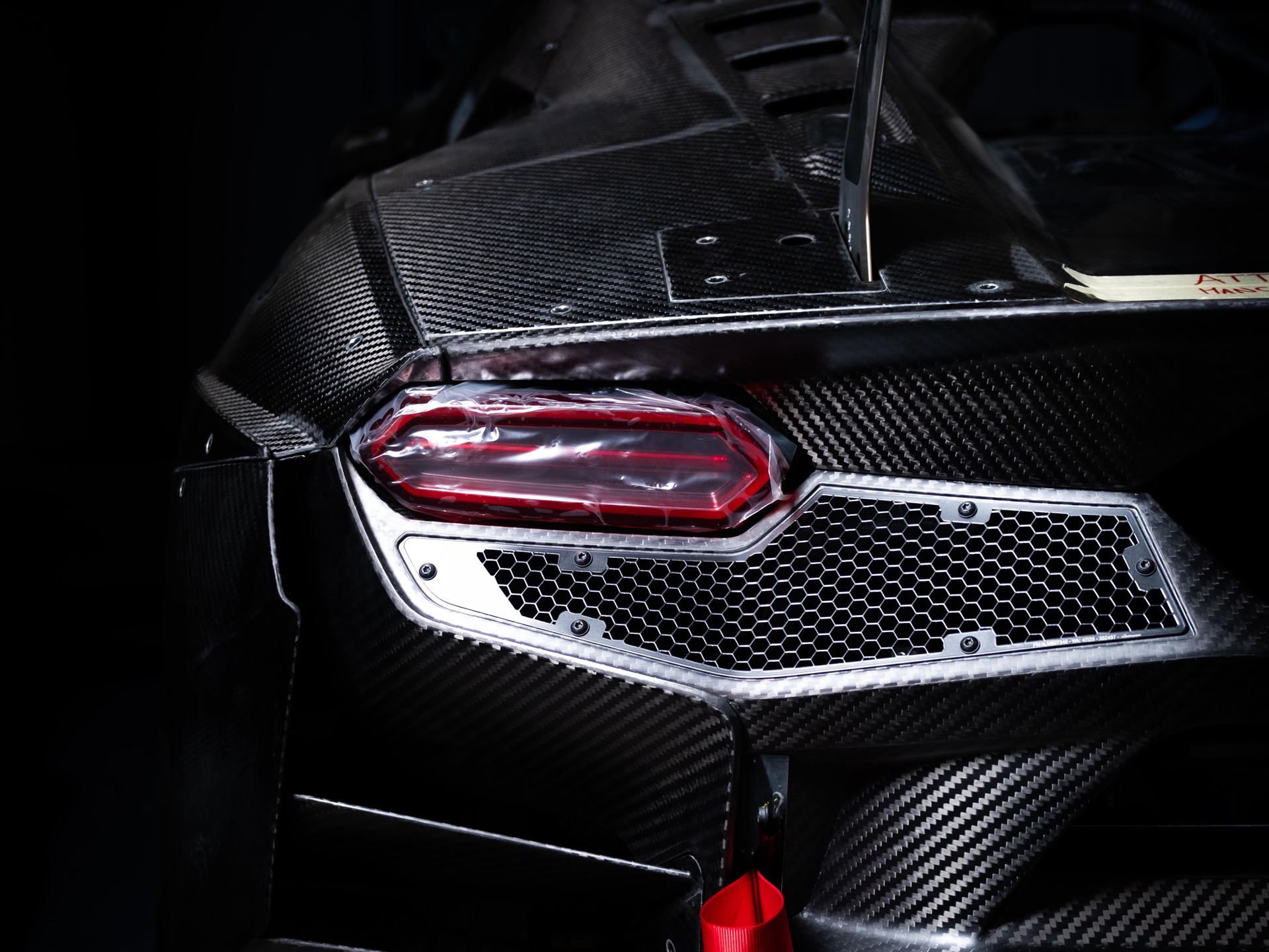 How Lamborghini Built A Gt3 Race Car That Shares Your Road Car'S Engine 9 Sc63 lmdh other rear three quarter detail 005