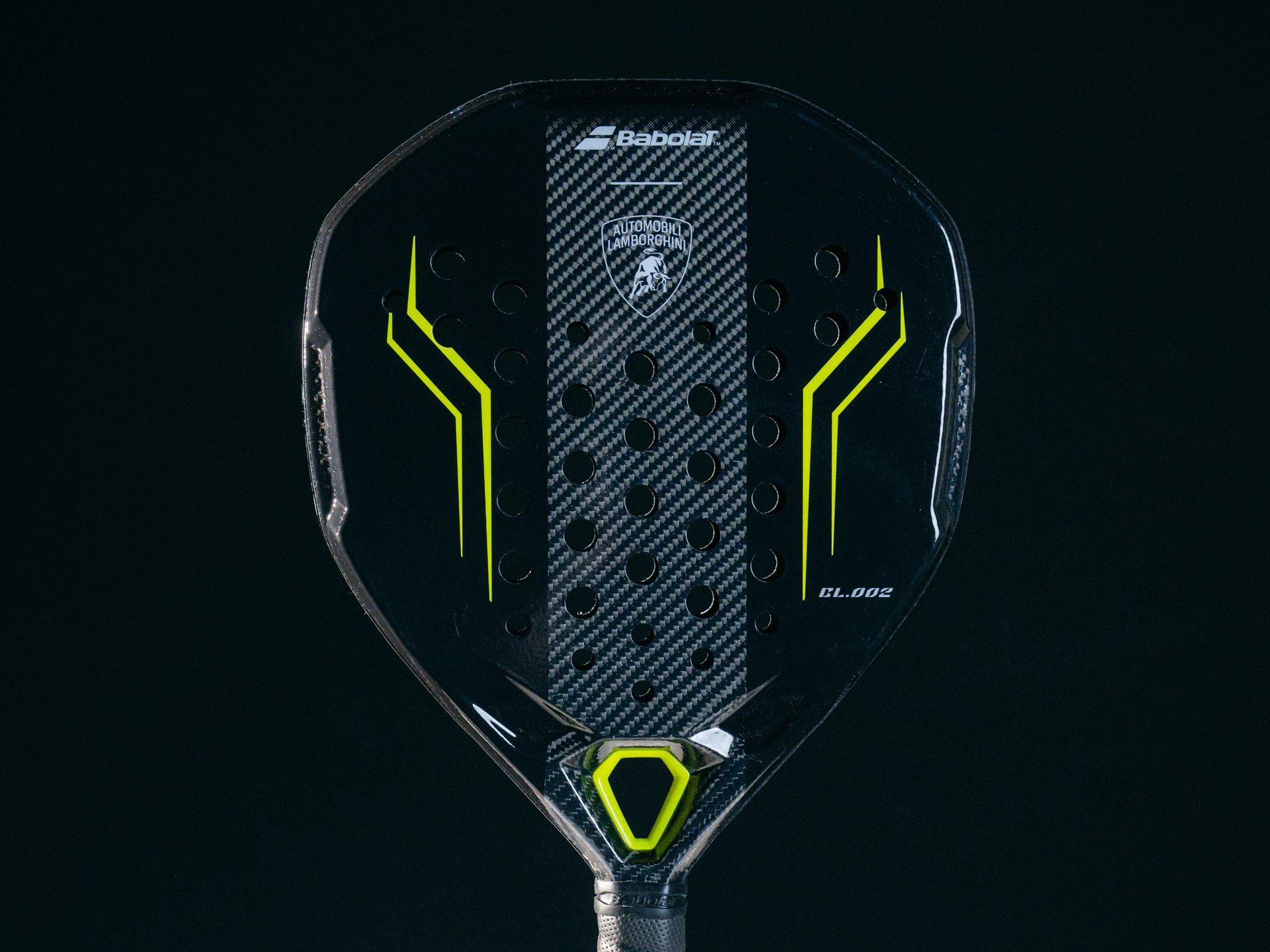 Babolat X Lamborghini Bl002: Carbon Fiber Expertise Meets The Padel Court At $650 7 Black babolat x lamborghini bl002 padel racquet with yellow accents showing carbon fiber weave and lamborghini branding