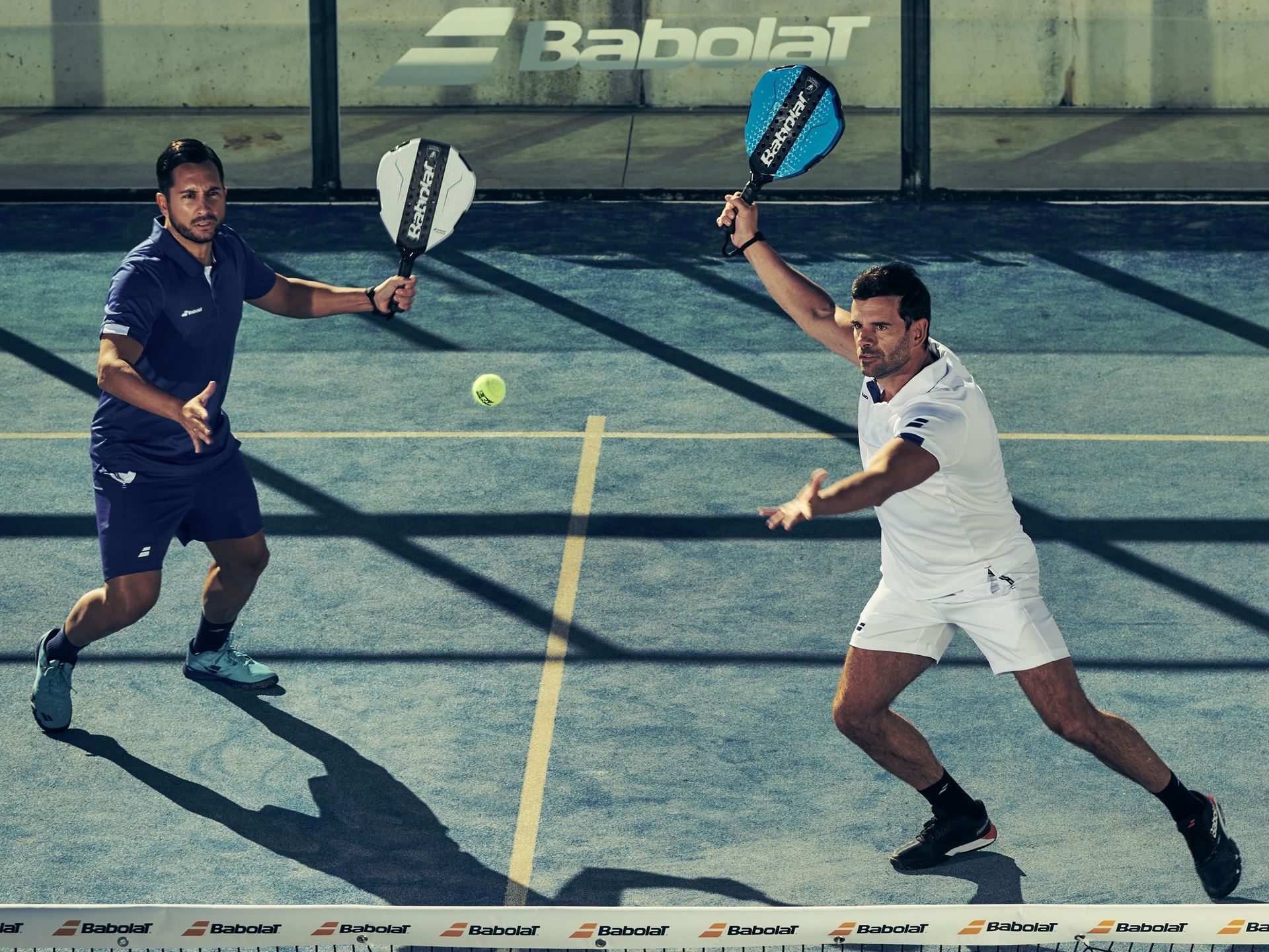 Lamborghini'S Koridion Foam Now Lives Inside A Padel Racquet: The Bl003 Explained 9 Two players in action on blue padel court with babolat lamborghini racquets and ball in mid-air