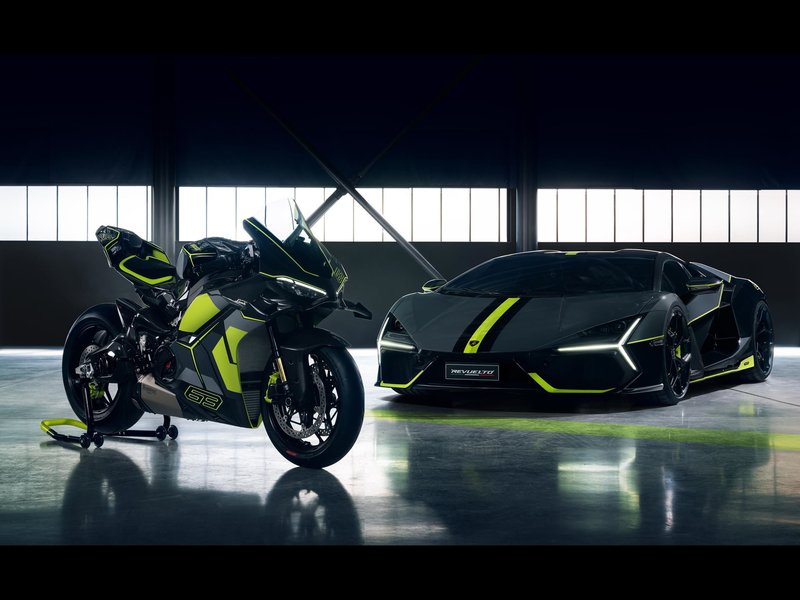Lamborghini Revuelto and Ducati Panigale V4 Lamborghini side by side in matching dark gray and Verde Scandal livery