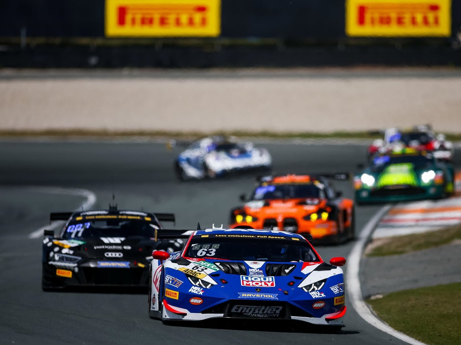 The #63 Lamborghini Huracán GT3 EVO in Team Engstler livery leads a pack of GT3 competitors at Zandvoort during the ADAC GT Masters