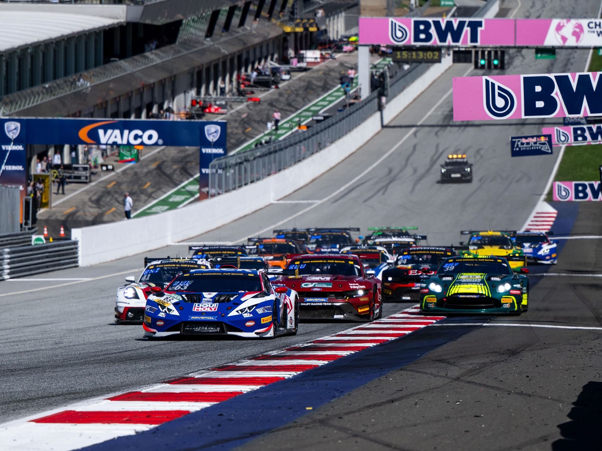 0.147 Seconds At Red Bull Ring: How The Huracán Gt3 Evo2 Opened Its Final Season With A Statement 5 Pack of gt3 race cars including a blue and white lamborghini huracán gt3 evo2 navigating a turn at the red bull ring