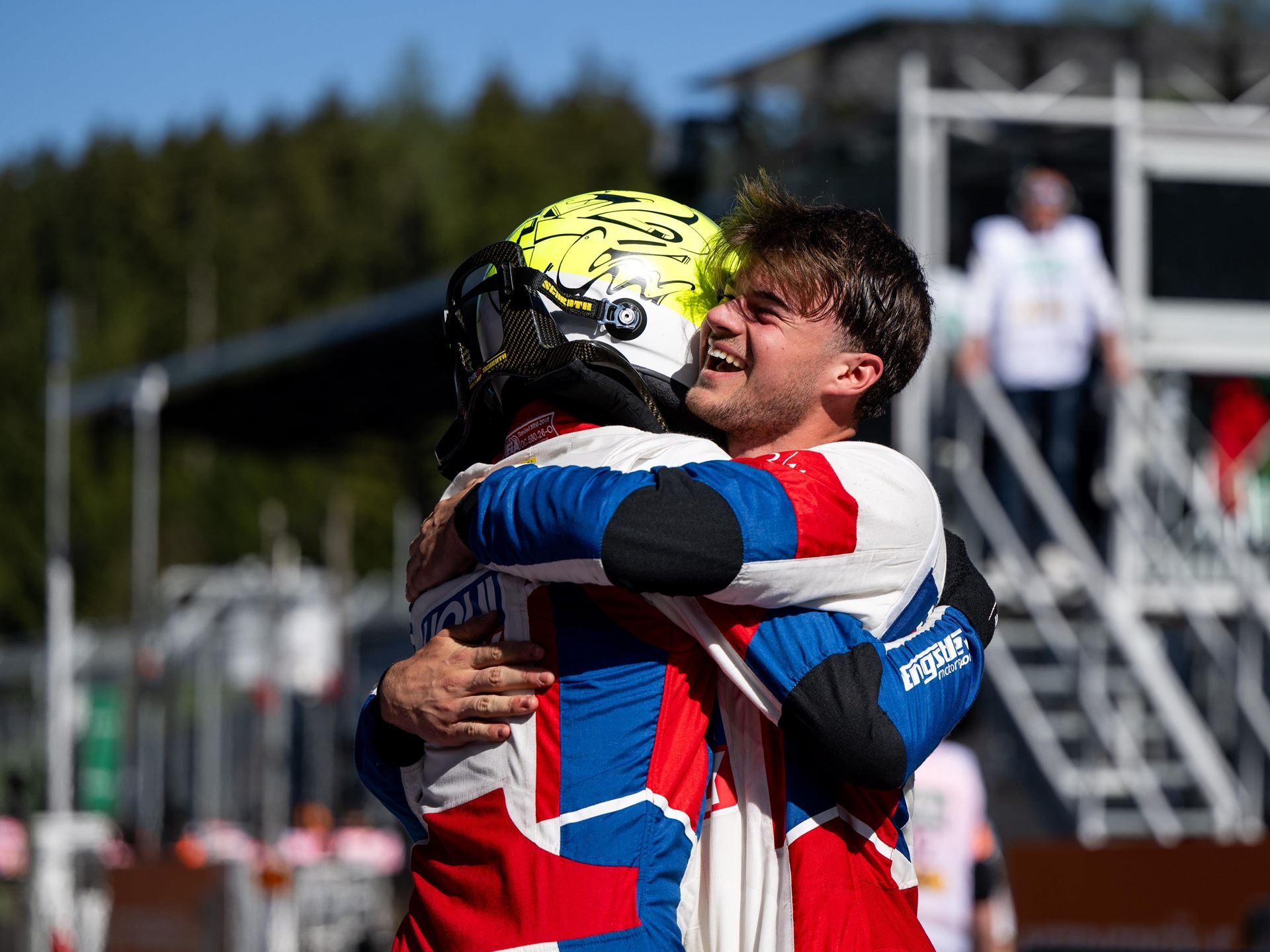 0.147 Seconds At Red Bull Ring: How The Huracán Gt3 Evo2 Opened Its Final Season With A Statement 3 Two lamborghini racing drivers embracing in celebration after a race victory