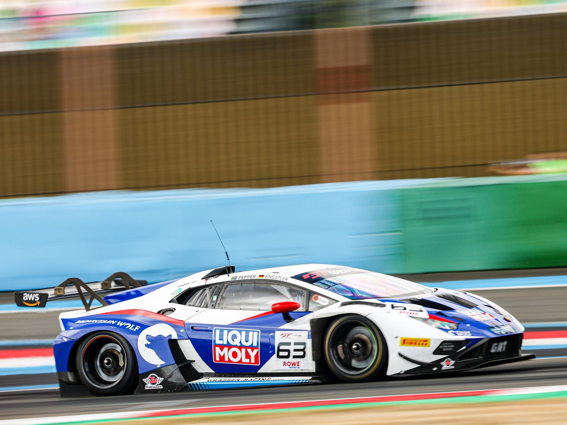 The Huracán Gt3 Evo2'S Magny-Cours Victory Adds A Defining Chapter To Lamborghini'S V10 Racing Legacy 9 The #63 lamborghini huracán gt3 evo2 at speed on the magny-cours circuit in a dynamic side profile with motion blur