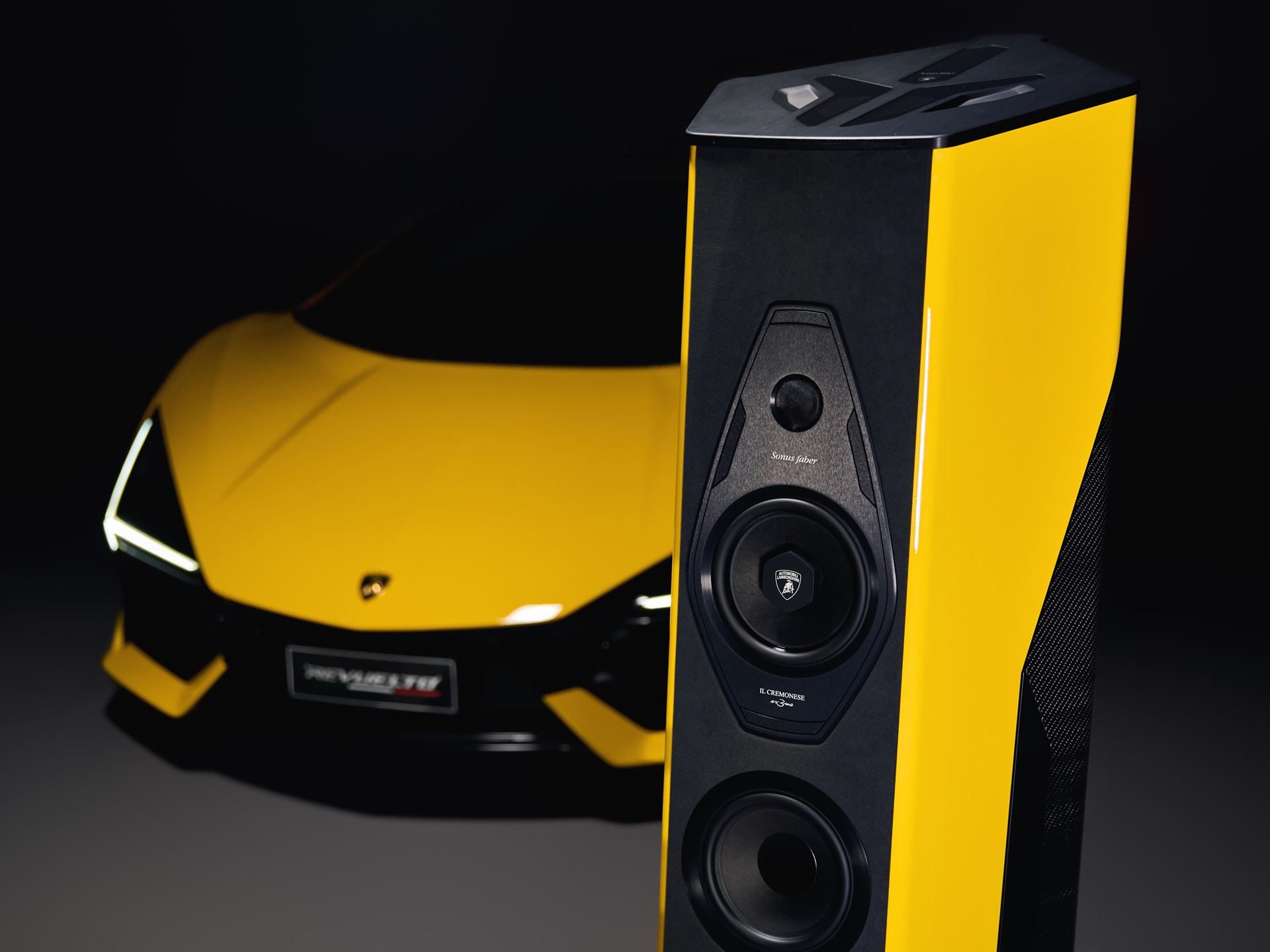 Lamborghini'S $130,000 Sonus Faber Speakers: What 50 Pairs And Five Paint Codes Reveal About The Brand'S Exclusivity Strategy 9 Close-up of one il cremonese ex3me lamborghini edition speaker in giallo countach with the revuelto blurred in the background