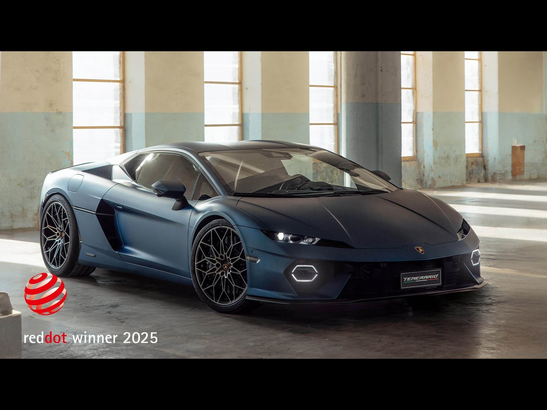 Every Lamborghini In The Lineup Just Won A Red Dot Award, And The Revuelto Took Top Honors 5 Matte blue lamborghini temerario displayed in an industrial setting with arched windows, showcasing its sleek side profile