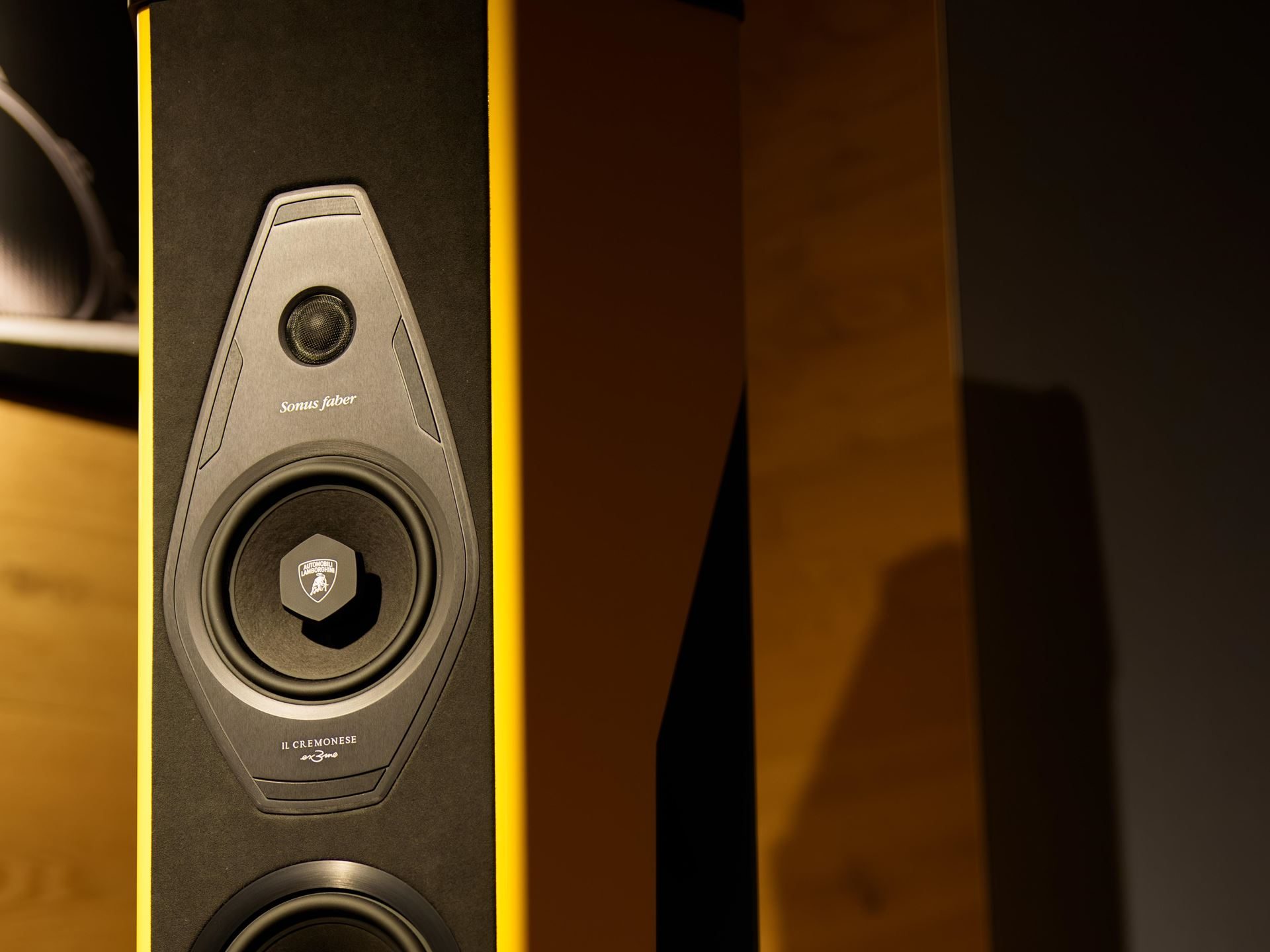 Accademia Neve 2026 Puts The Temerario On Ice, And Lamborghini'S Experiential Edge Over Rivals On Full Display 7 Close-up of sonus faber speaker with lamborghini shield logo on the woofer and yellow accents