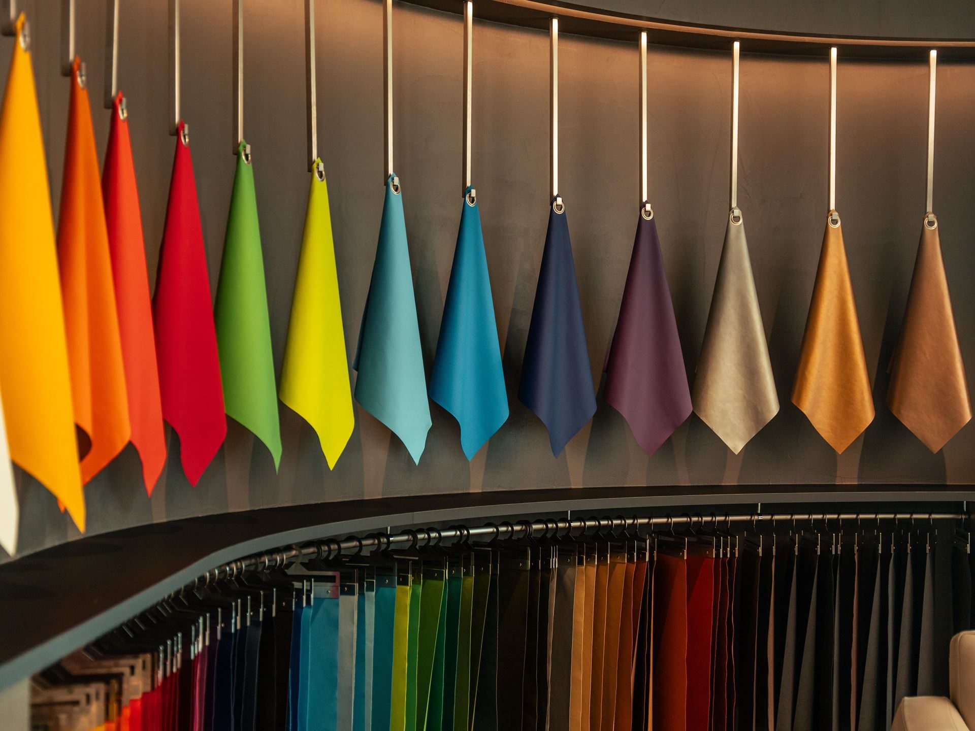 Why Lamborghini Names Its Paint Colors After Greek Gods And Diamond Dust 9 Display of numerous colorful leather swatches hanging in the ad personam showroom