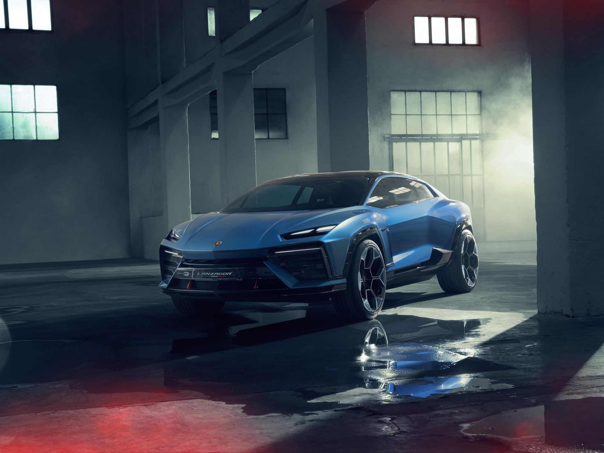 How One Decision In 2003 Gave Lamborghini Total Control Over Its Design Destiny 13 Lamborghini lanzador all-electric 2+2 gt concept in a moody industrial setting with dramatic lighting and wet floor reflections