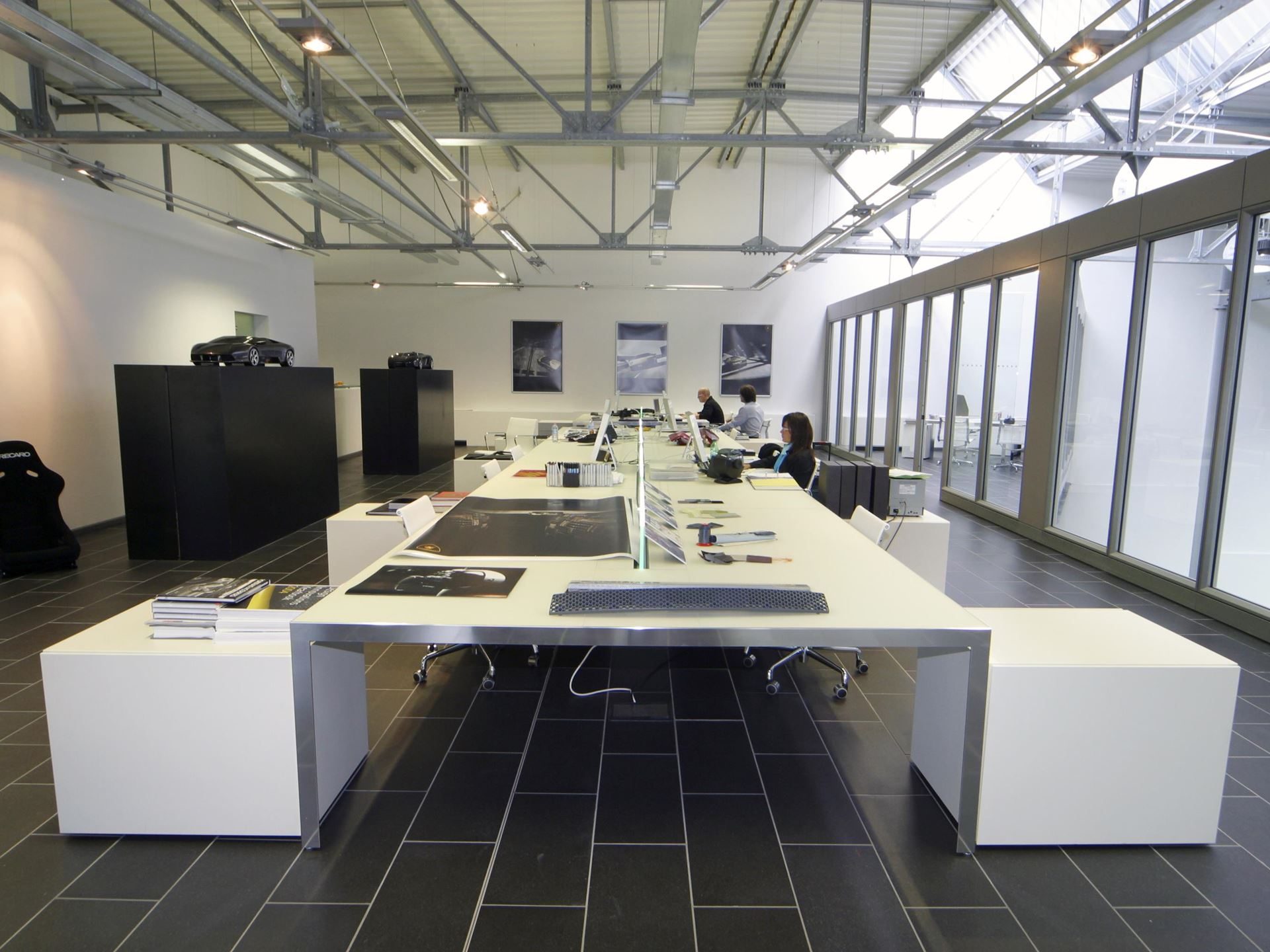 How One Decision In 2003 Gave Lamborghini Total Control Over Its Design Destiny 3 Interior view of the lamborghini centro stile design studio with long desks, computers, and designers at work