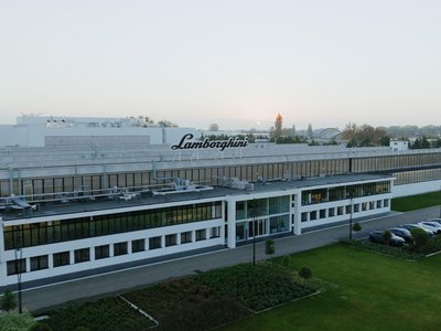 Aerial view of the lamborghini factory at sant'agata bolognese with the iconic logo on the roof