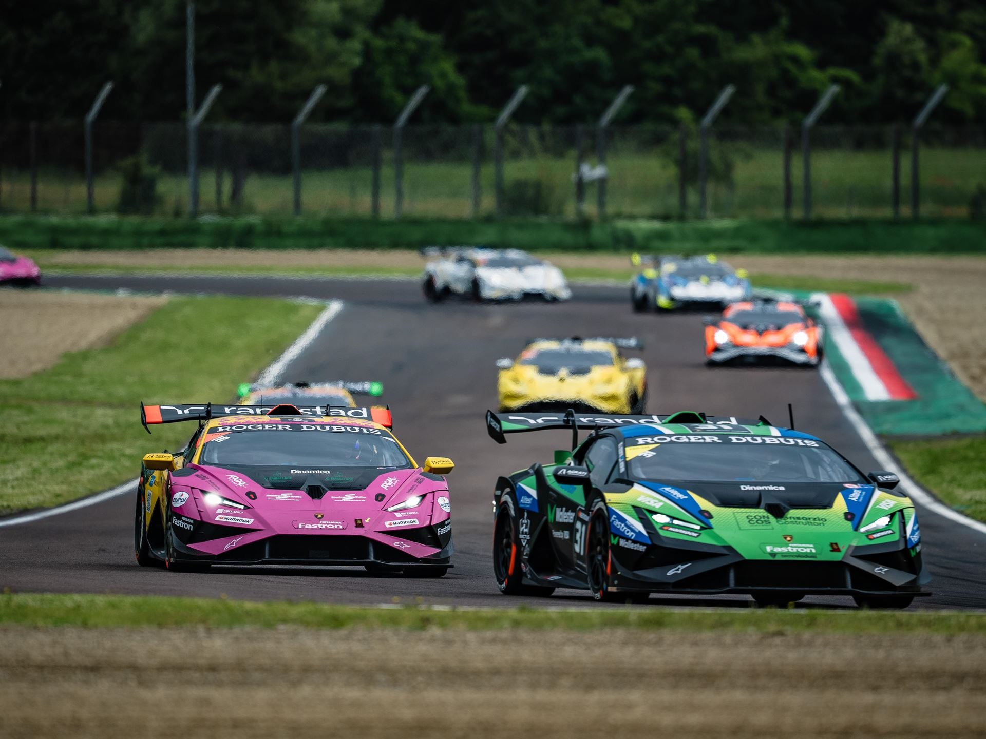 Fenomeno Roadster: 15 Units Of 1,080 Cv Open-Top V12 Fury Headline Lamborghini Arena 2026 7 Multiple lamborghini huracán super trofeo evo2 race cars in colorful liveries competing on the imola circuit