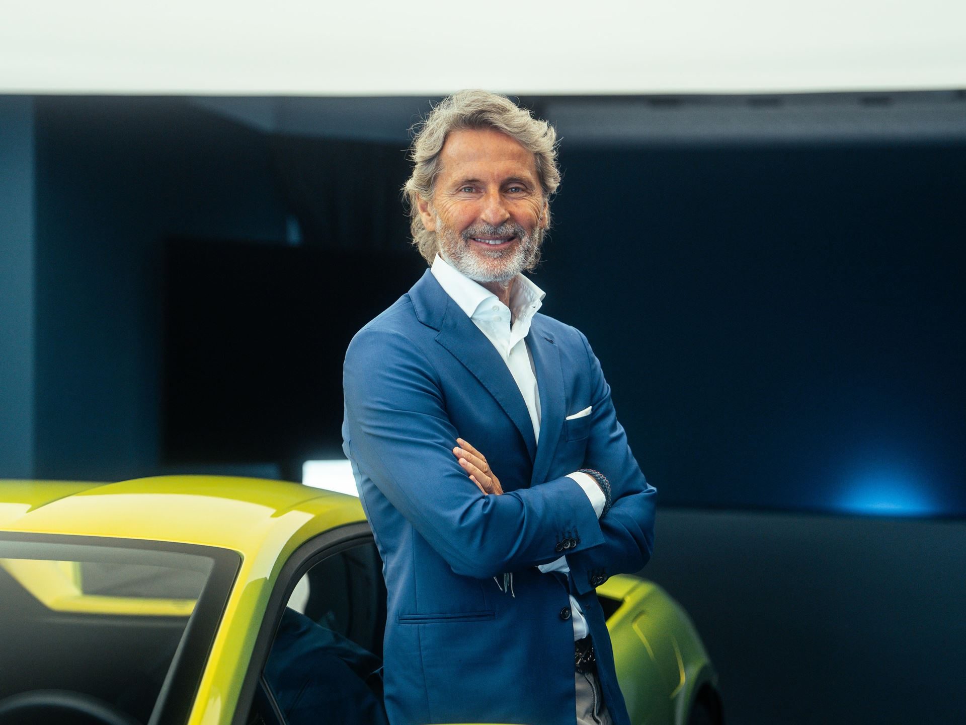 Lamborghini'S Hybrid Bet Pays Off: Record Deliveries, A Killed Ev, And 26.6% Margins Tell The Real Story 3 Stephan winkelmann, ceo of automobili lamborghini, standing in front of a yellow lamborghini revuelto