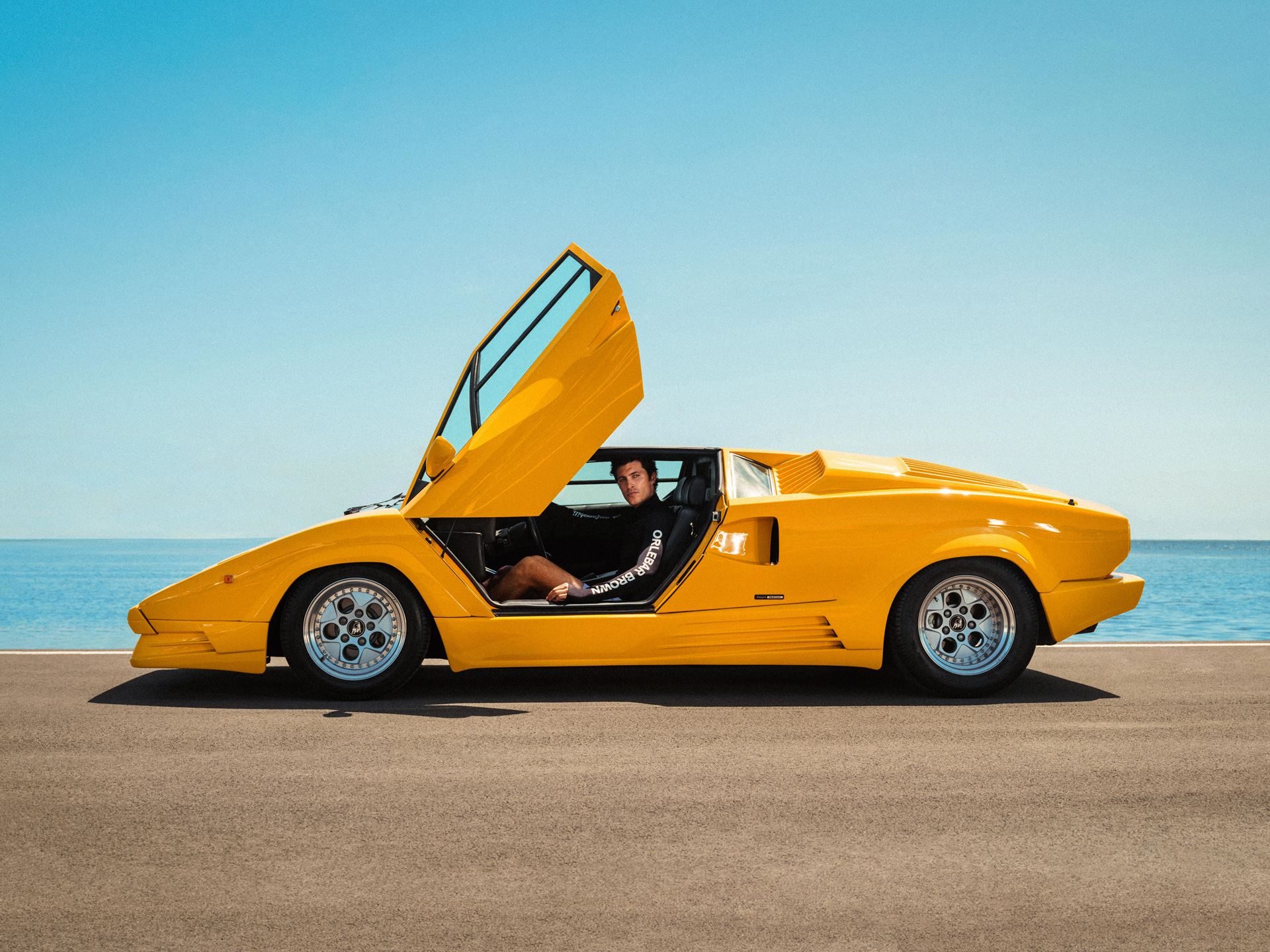 Lamborghini'S Orlebar Brown Beach Collection Turns Countach Lines And Ad Personam Colors Into Luxury Swimwear 17 Lamborghini orlebar brown beach collection draft 5da82473 lifestyle 005