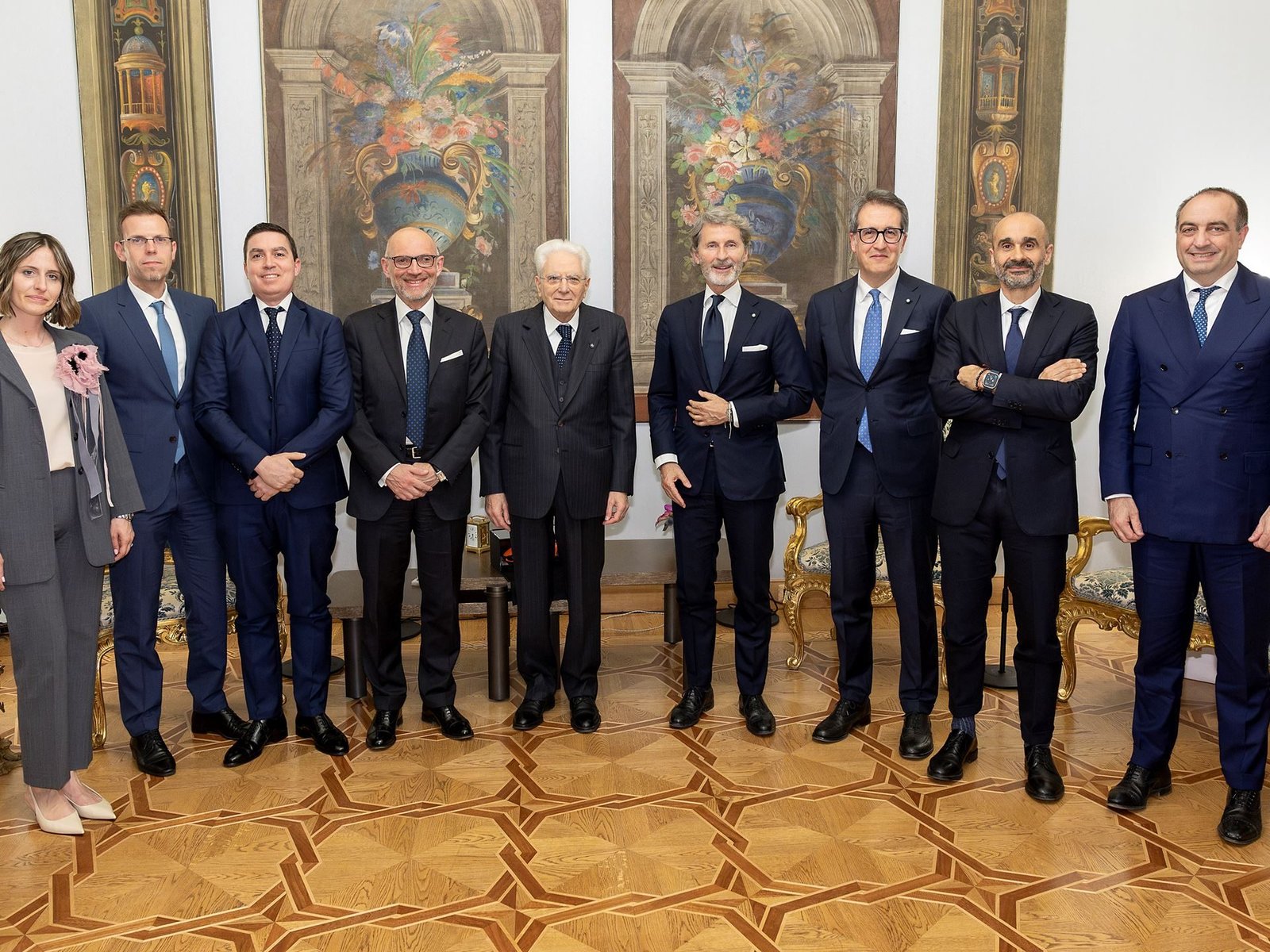 Lamborghini executives pose with Italian President Sergio Mattarella at the Quirinale Palace in Rome