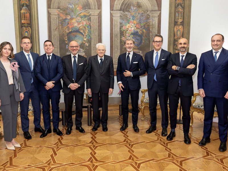 Lamborghini executives pose with Italian President Sergio Mattarella at the Quirinale Palace in Rome