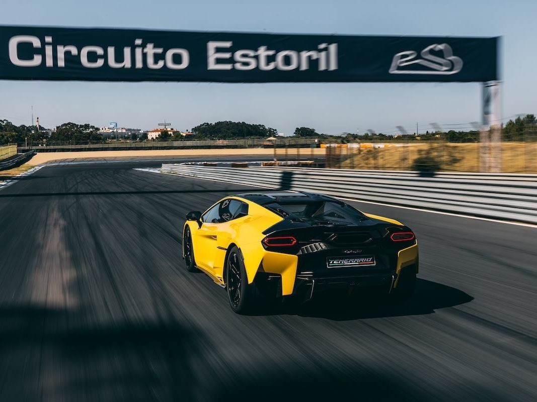 Lamborghini'S 24.6% Profit Margin Bankrolls The Temerario Era, Even As Tariffs And Currency Bite 9 Yellow lamborghini temerario speeding under the circuito estoril banner on the racetrack