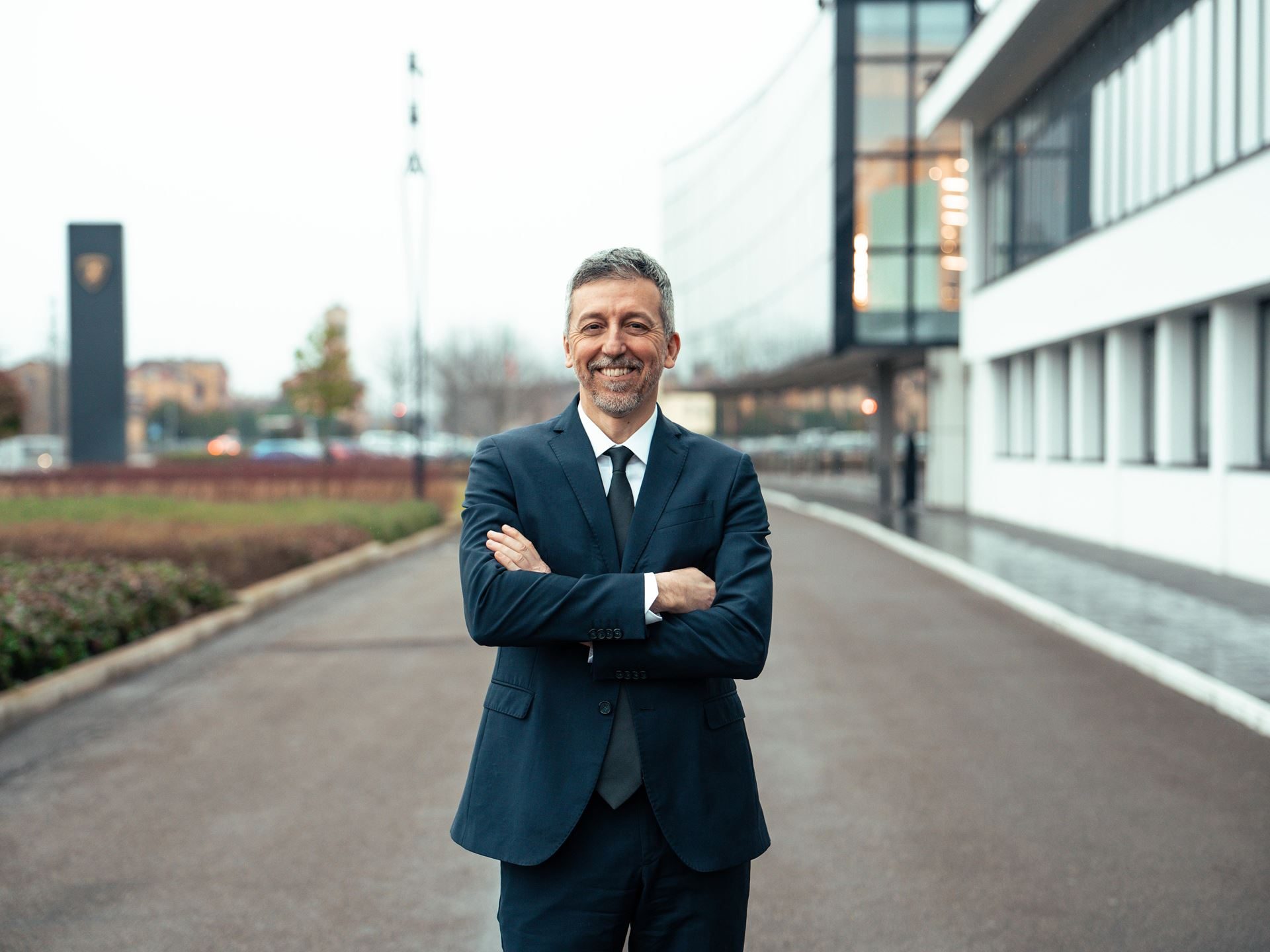 Lamborghini'S New Quality Director Brings 20 Years Of Factory-Floor Experience And Audi Training To Sant'Agata 3 Andrea costantini standing outdoors in front of a modern building at lamborghini headquarters