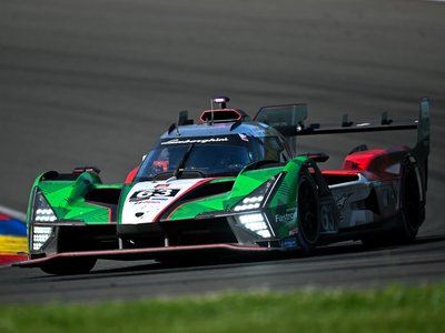 Lamborghini Sc63 Returns To Its Breakthrough Circuit At Indianapolis, Carrying Watkins Glen Momentum 2 Lamborghini sc63 lmdh prototype in green, white, and red livery racing on track