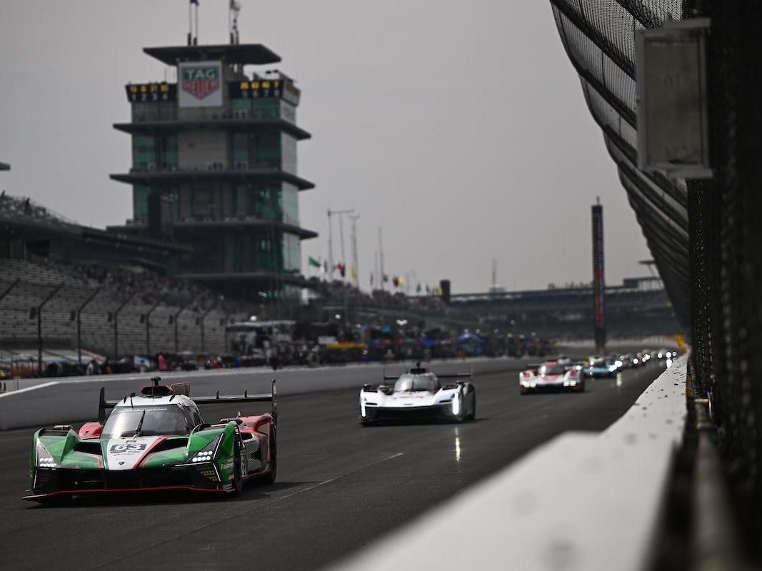 The Lamborghini Sc63'S 'Evo Joker' Suspension Finally Showed What This Car Can Do, Just As The Program Winds Down 3 Lamborghini sc63 leading a pack of prototype cars on track with the indianapolis motor speedway pagoda visible in the background