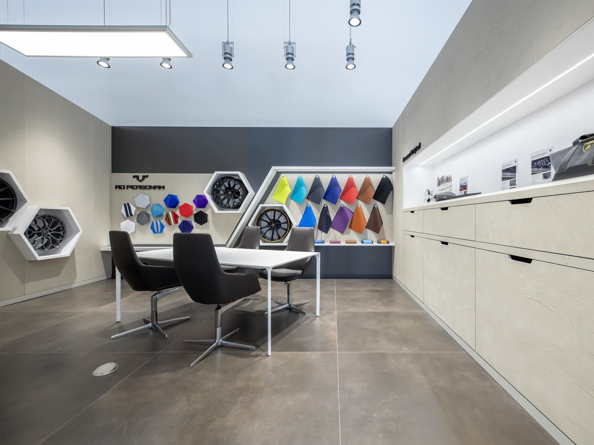 Lamborghini Opens Its First Official Showroom In Georgia, Premiering The Temerario In Tbilisi 9 Lamborghini ad personam customization area in the tbilisi showroom with color swatches, wheel displays, and consultation table