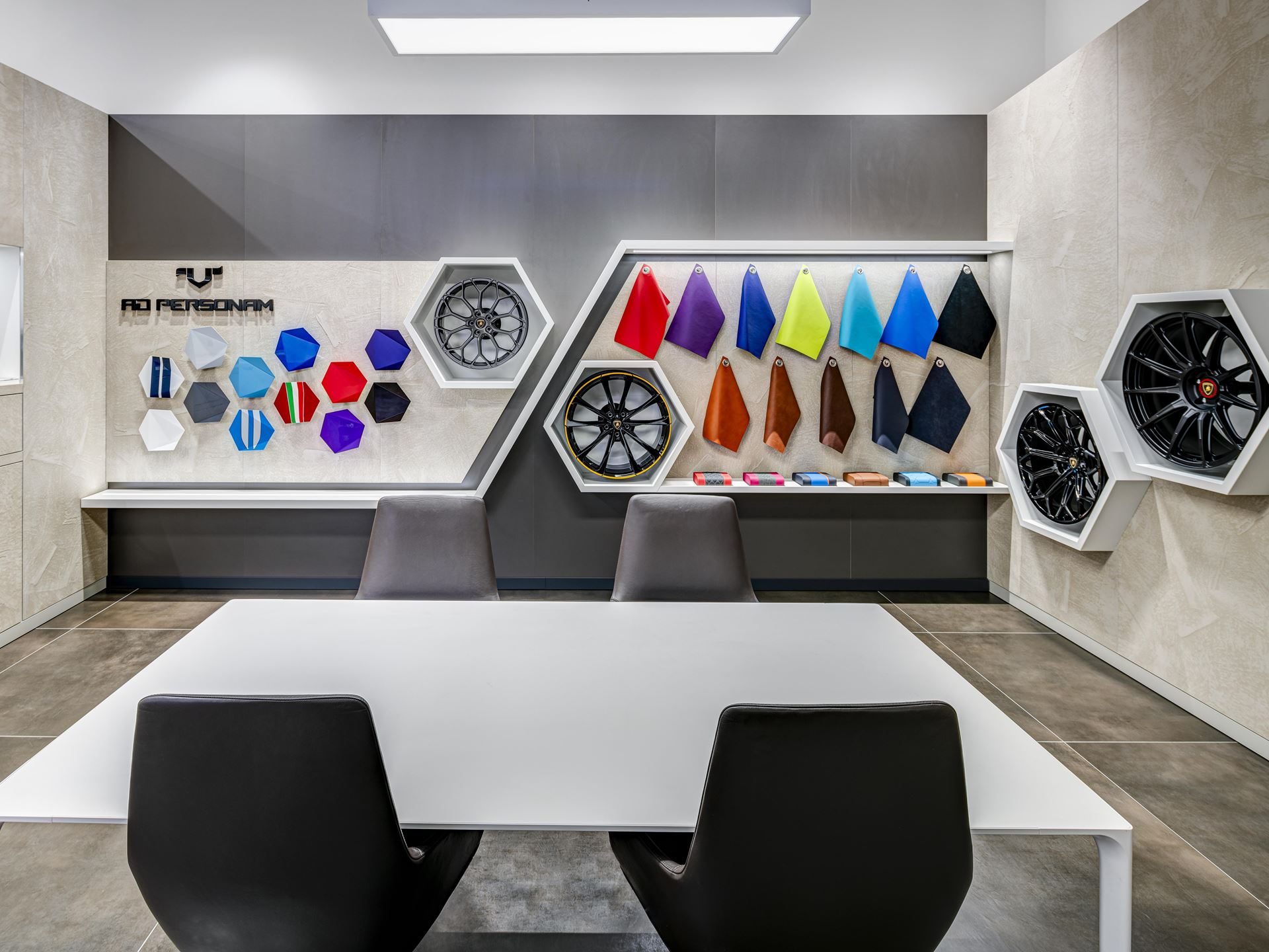 Lamborghini'S Temerario Brings A 10,000 Rpm V8 To Florida'S Seventh Showroom 9 Lamborghini ad personam customization studio with hexagonal shelves displaying paint swatches, leather samples, and wheel options