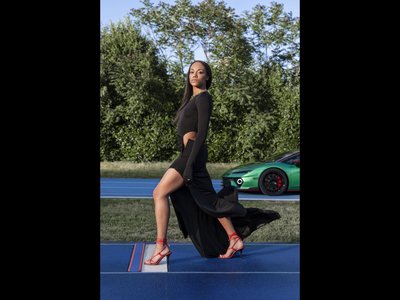 Lamborghini'S Temerario Campaign With Larissa Iapichino Sells The Physics Of The Split Second 2 Green lamborghini temerario on a blue running track with italian long jumper larissa iapichino posing in a black dress and red heels