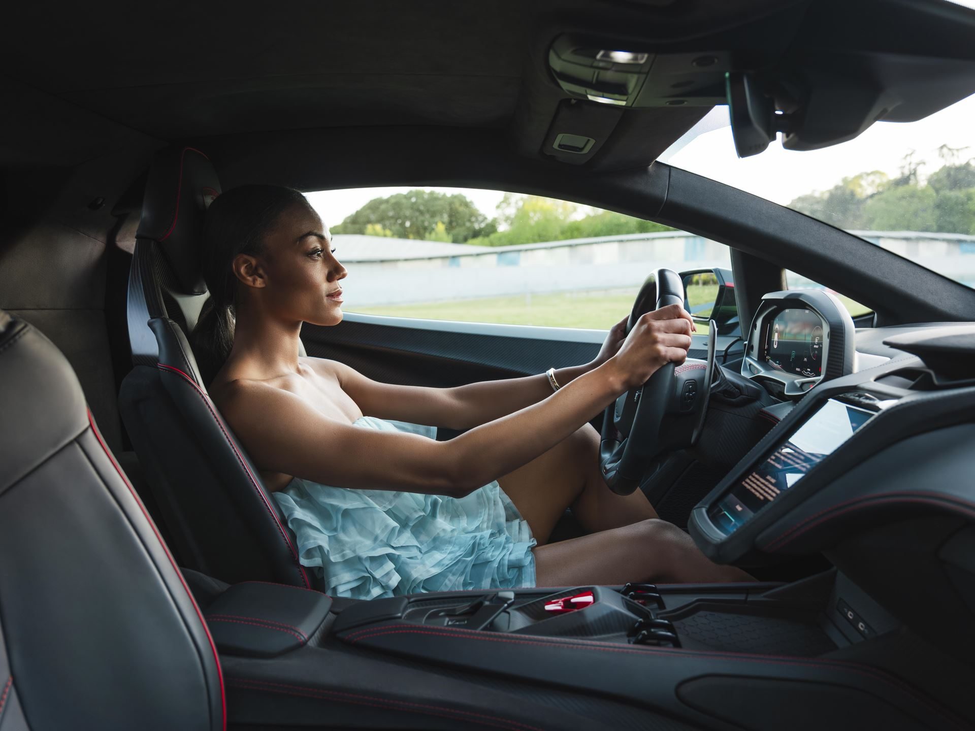 Lamborghini'S Temerario Campaign With Larissa Iapichino Sells The Physics Of The Split Second 5 Interior view of the lamborghini temerario showing the digital instrument cluster and steering wheel