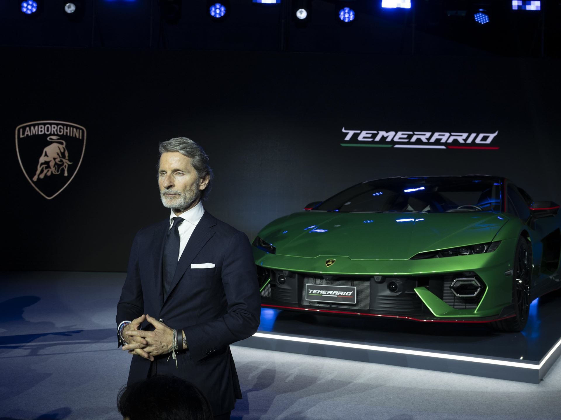 Lamborghini Temerario Lands In Korea With A 10,000-Rpm V8 That Borrows From Racing Engines 5 Stephan winkelmann presenting the lamborghini temerario on stage in seoul with lamborghini shield logo