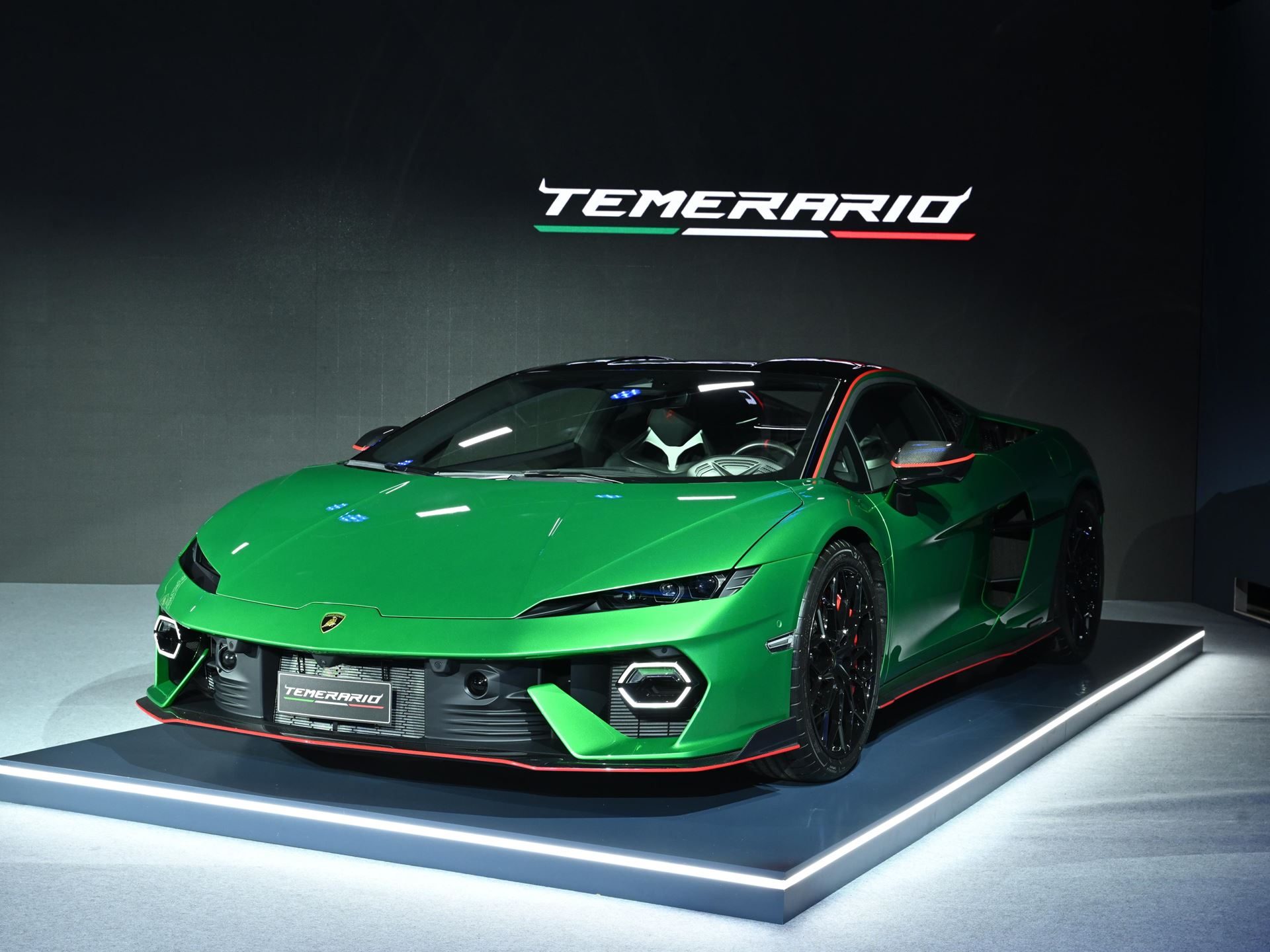 Green lamborghini temerario displayed on stage at the seoul premiere event with temerario branding