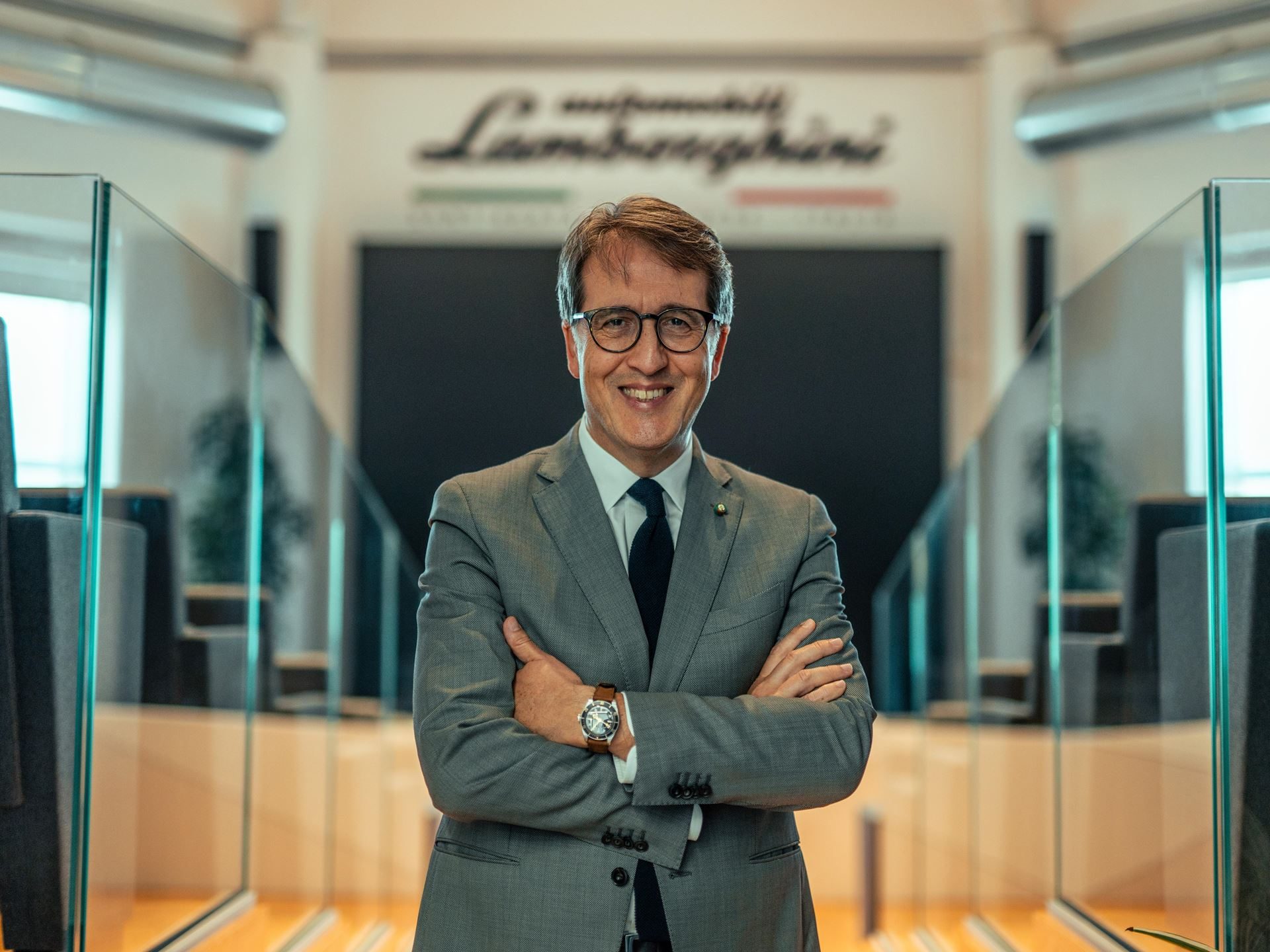 Lamborghini'S 12Th Consecutive Top Employer Award Reveals The Factory Floor Culture Behind Its Supercars 3 Umberto tossini, lamborghini chief people, culture and organization officer, standing in front of the automobili lamborghini logo
