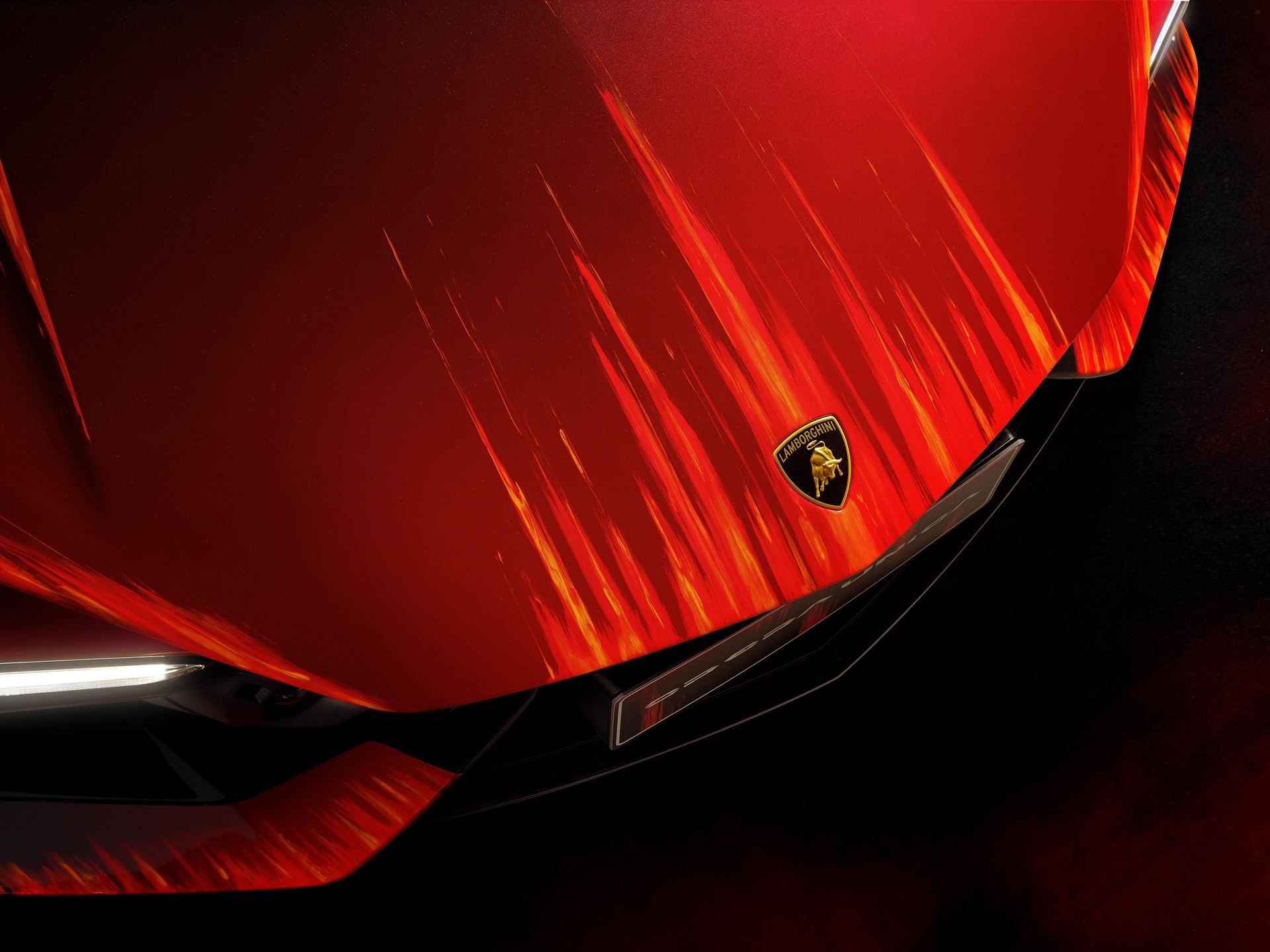 480 Hours Of Hand-Painting: The Third Revuelto Opera Unica Targets China'S Collectors 5 Close-up of the revuelto opera unica front hood showing hand-painted red and orange brushstroke livery and lamborghini emblem