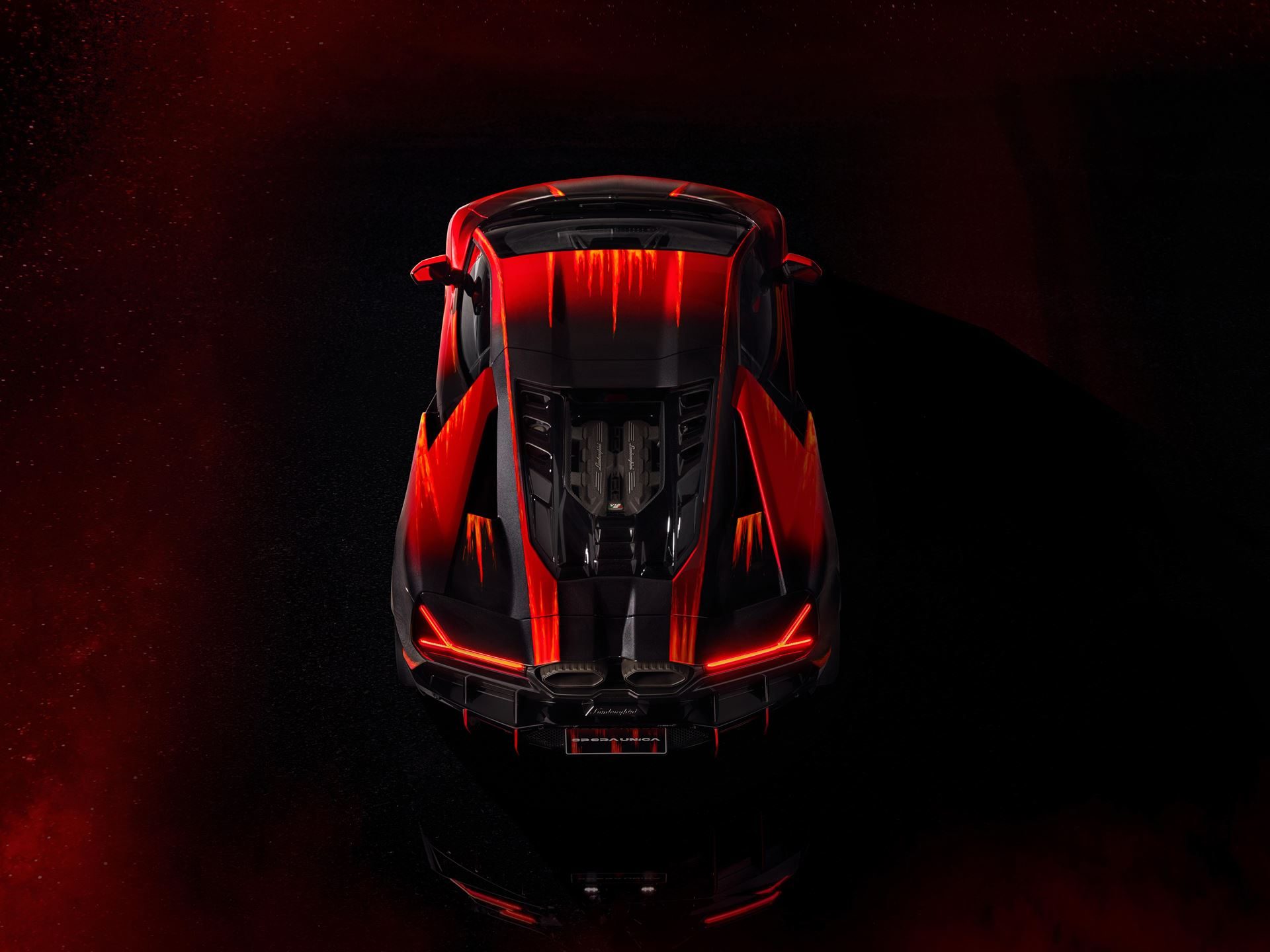 480 Hours Of Hand-Painting: The Third Revuelto Opera Unica Targets China'S Collectors 7 Overhead rear view of the revuelto opera unica showing hand-painted red and black livery with dynamic streaks across the engine cover