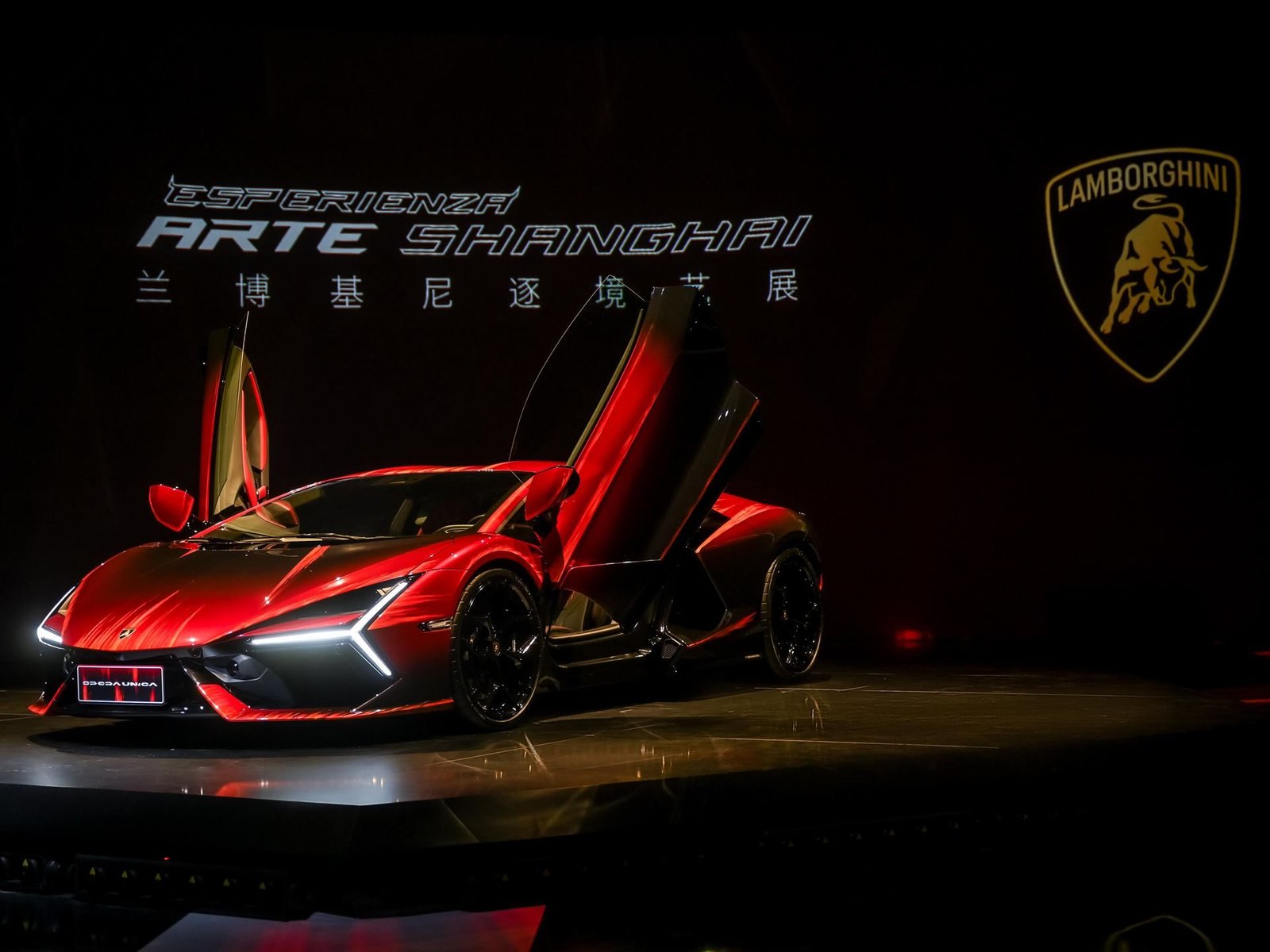 Lamborghini Revuelto Opera Unica with scissor doors open on stage at Esperienza Arte Shanghai
