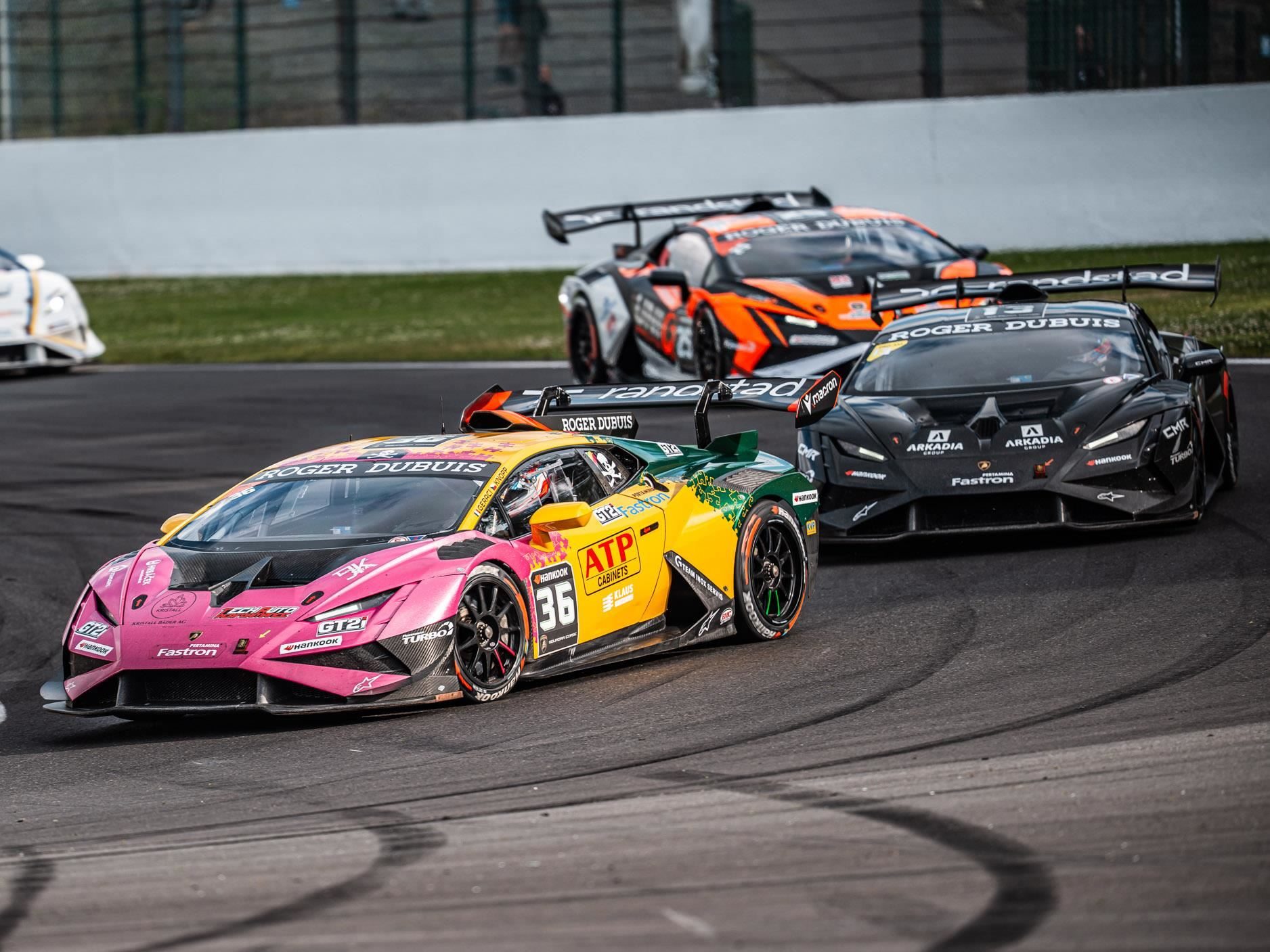 Every Super Trofeo Europe Title Still Up For Grabs As Nürburgring Kicks Off The Second Half 3 Three lamborghini huracán super trofeo evo2 race cars in colorful liveries racing closely on track