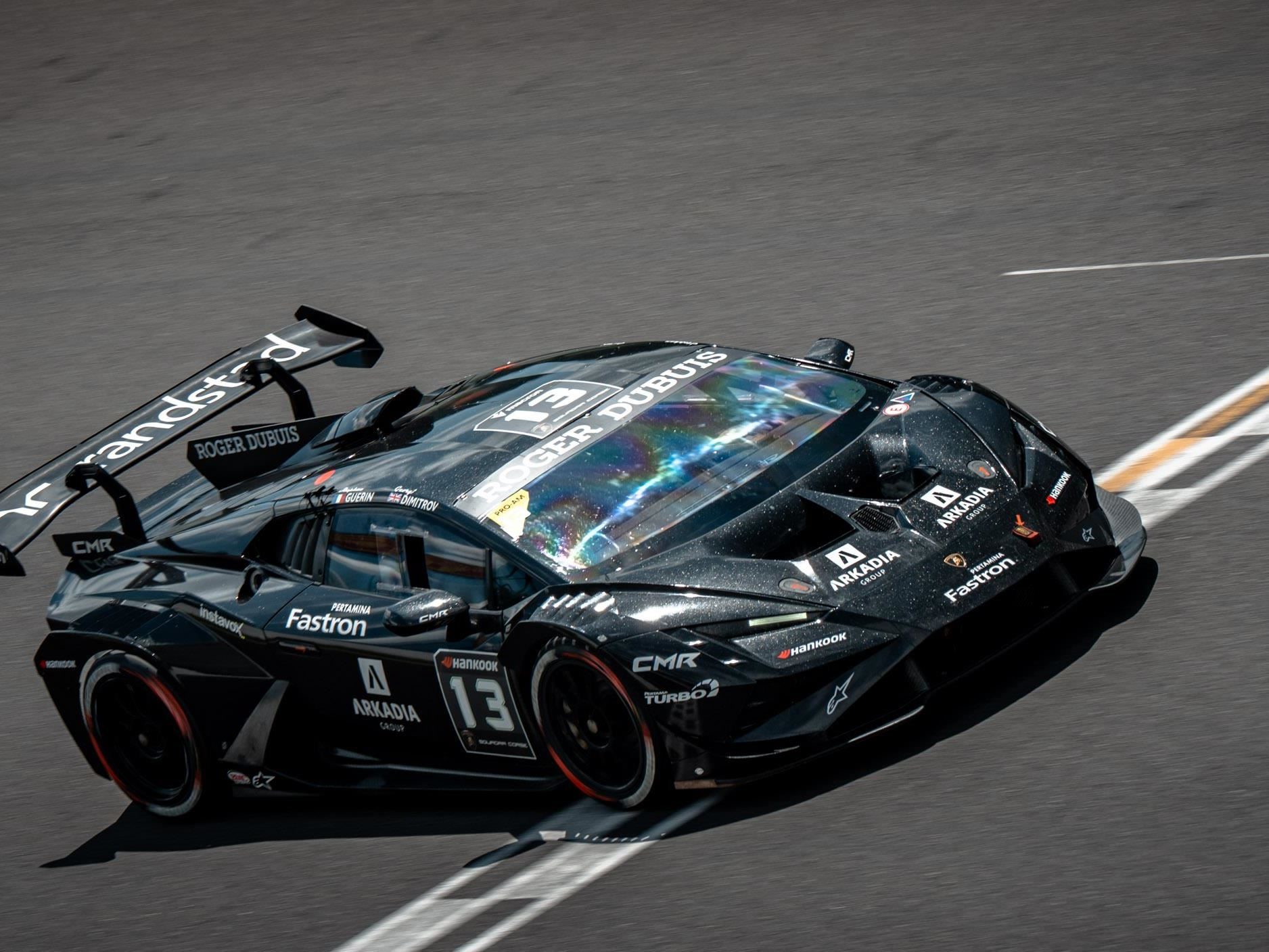Every Super Trofeo Europe Title Still Up For Grabs As Nürburgring Kicks Off The Second Half 7 A black lamborghini huracán super trofeo evo2 with iridescent windshield detail mid-corner on a racetrack