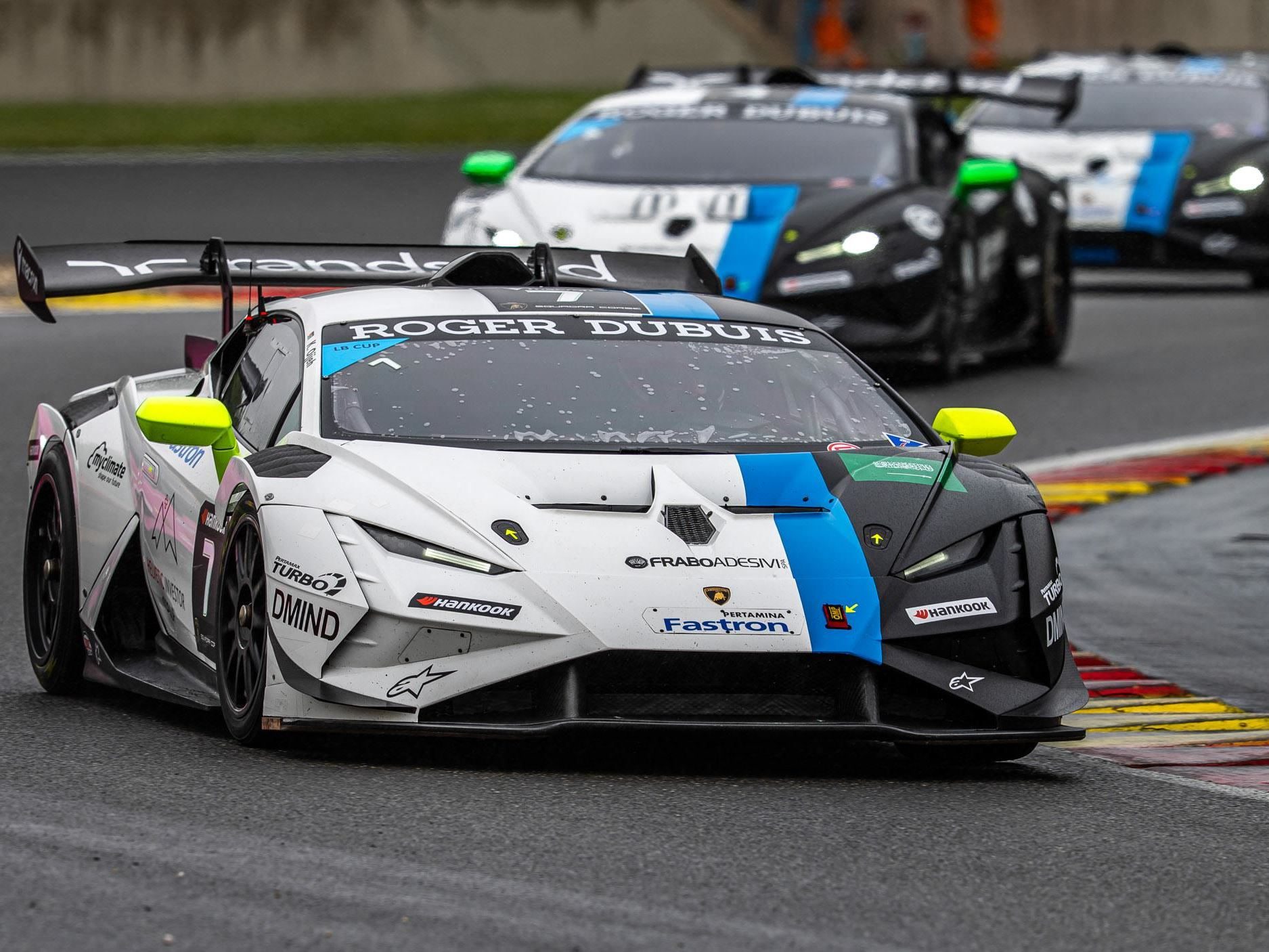 Every Super Trofeo Europe Title Still Up For Grabs As Nürburgring Kicks Off The Second Half 9 A lamborghini huracán super trofeo evo2 racing on a wet track with spray visible behind it