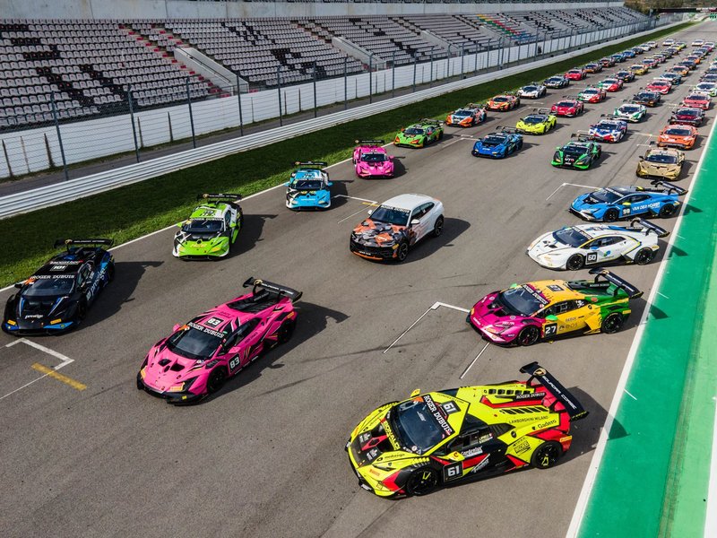 Aerial view of Lamborghini Huracán Super Trofeo EVO2 race cars lined up on a racetrack grid