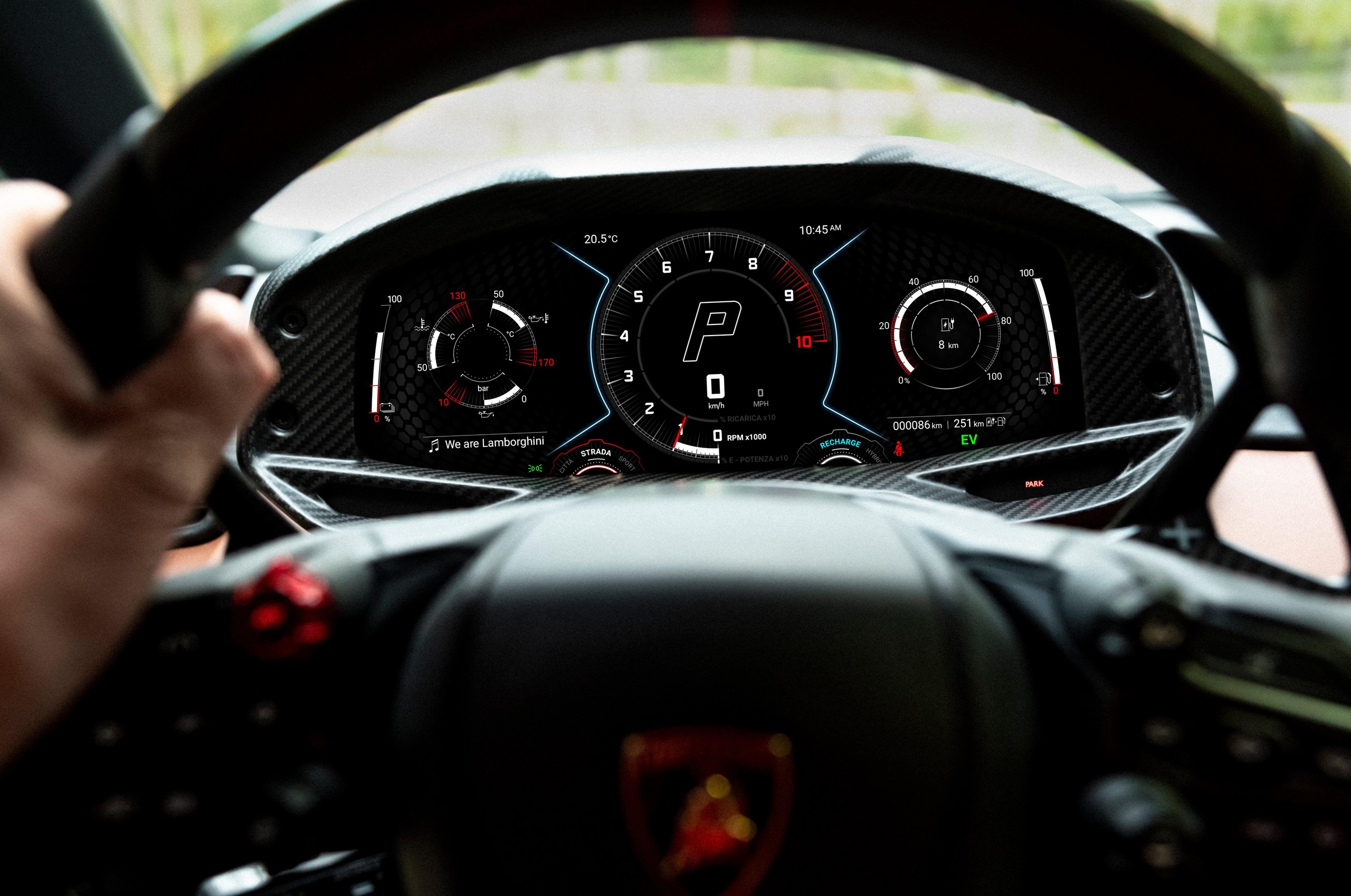 Anton Corbijn Photographs The Revuelto Like A Rock Star, And That'S Exactly Lamborghini'S Point 11 Driver's perspective of the lamborghini revuelto digital instrument cluster and steering wheel with carbon fiber trim