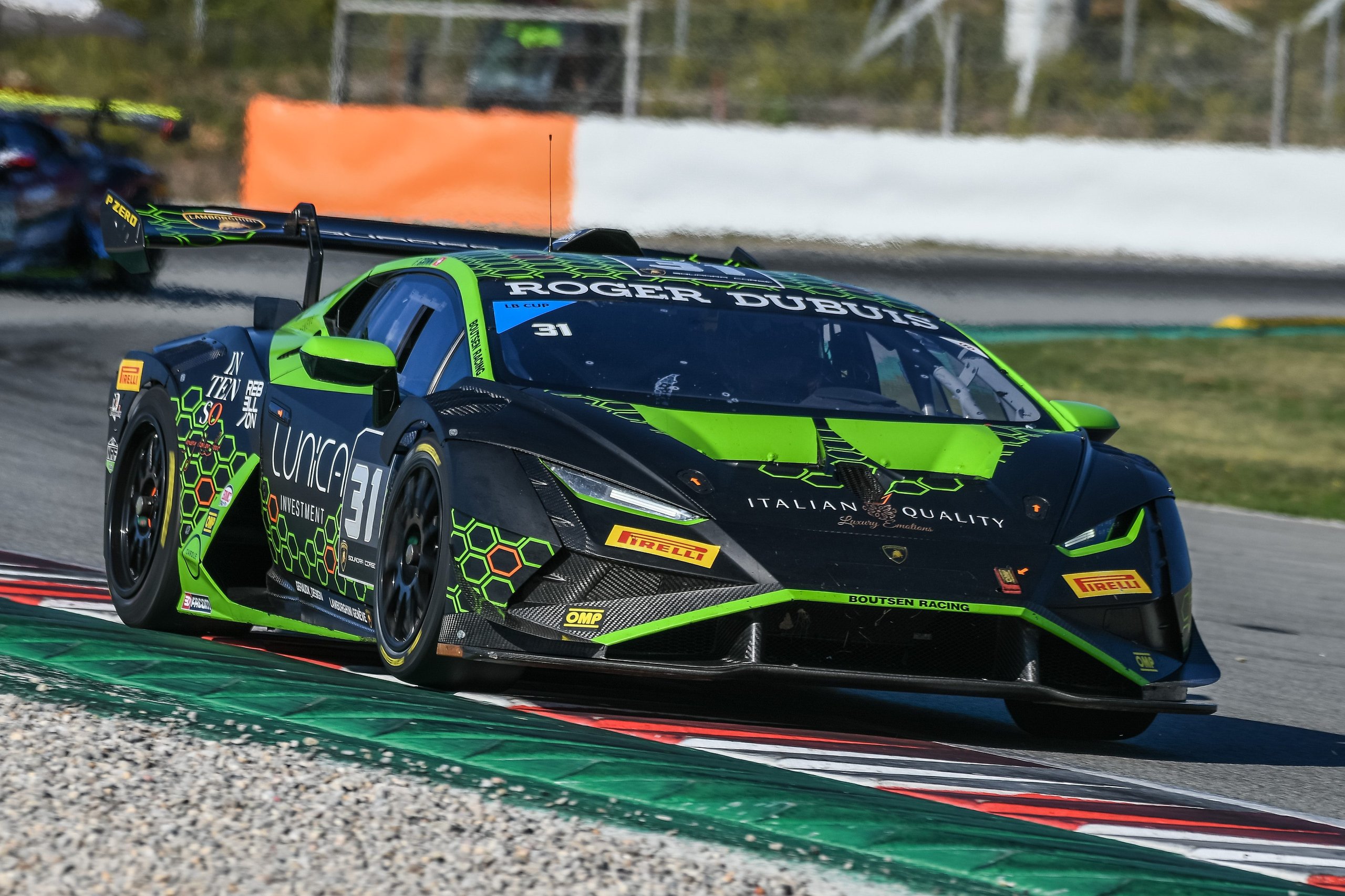 How Bonaldi Motorsport Turned A Botched Rival Pit Stop Into A Barcelona Title Sweep 9 A black and neon green lamborghini huracán super trofeo evo2 number 31 at speed on the barcelona racetrack