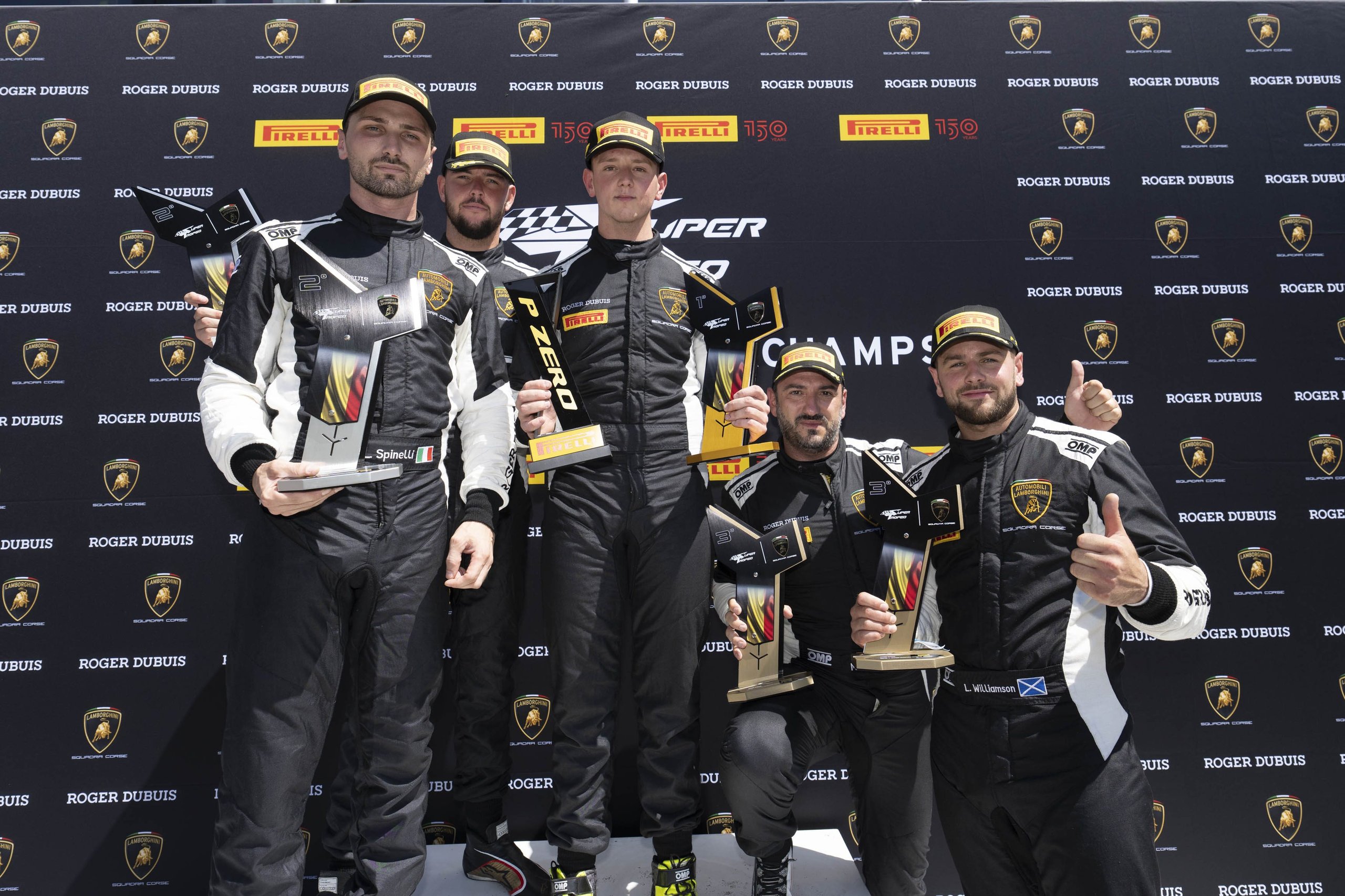 Bonduel'S Breakthrough At Spa: How Penalties And Chaos Handed A Local Hero His First Super Trofeo Europe Win 5 Four super trofeo europe race car drivers holding trophies on the podium with lamborghini backdrop