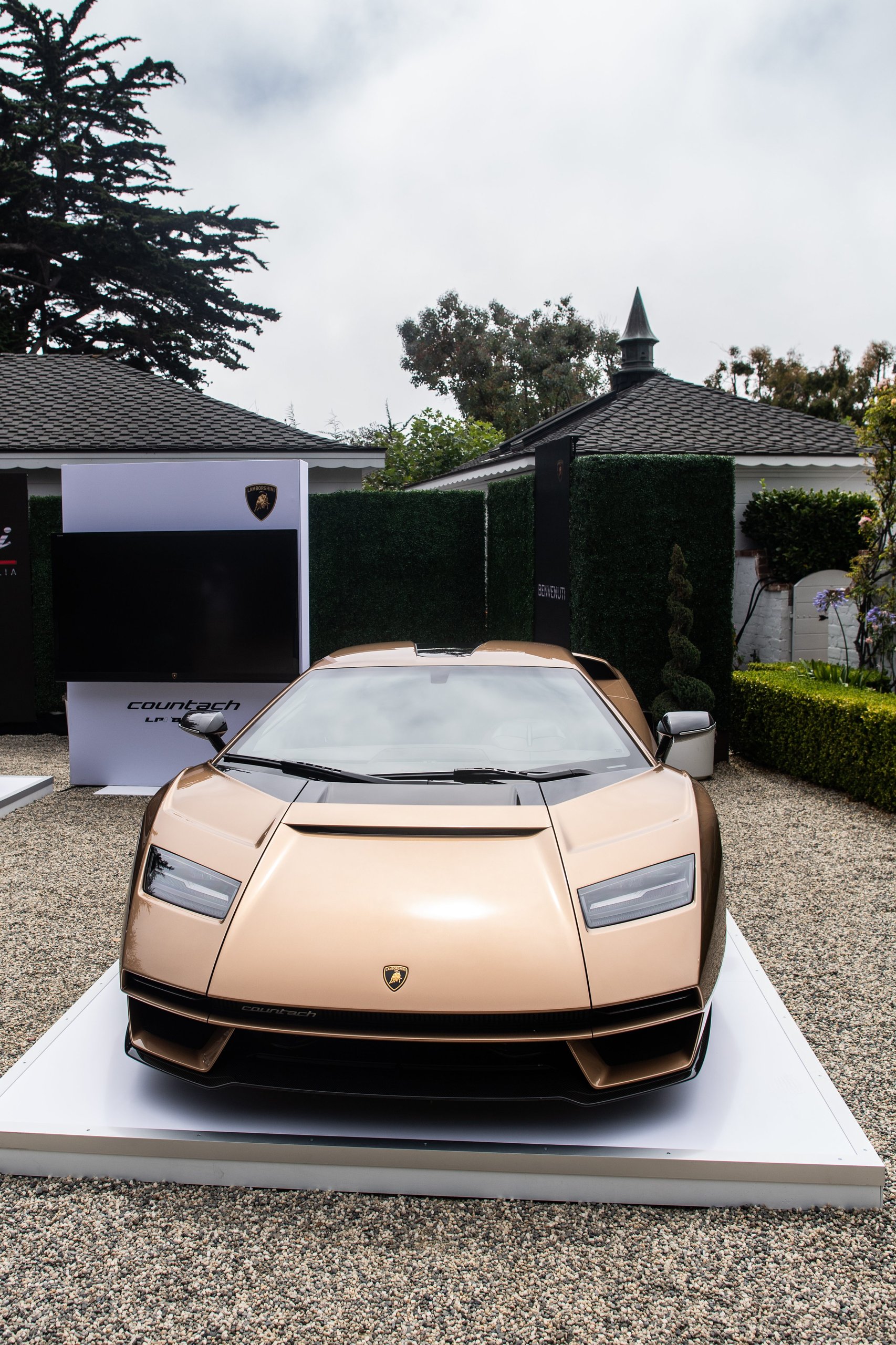 Lamborghini Handed Over Two Countach Lpi 800-4S At Monterey, And The Real Story Is What That Ceremony Signals 3 Front view of the bronze lamborghini countach lpi 800-4 showing angular headlights and prominent front splitter at monterey