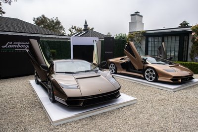 Lamborghini Handed Over Two Countach Lpi 800-4S At Monterey, And The Real Story Is What That Ceremony Signals 2 Two bronze lamborghini countach lpi 800-4 supercars displayed with scissor doors open at monterey car week 2022