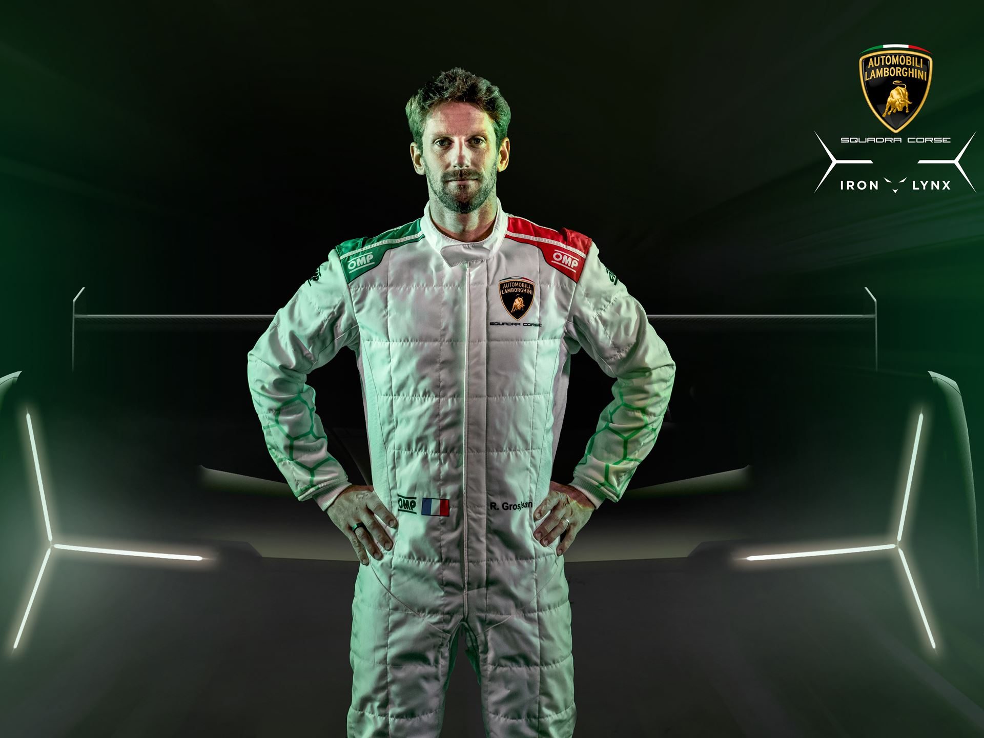 Why Lamborghini Hired An F1 Veteran To Build Its Hypercar Racing Future 7 Romain grosjean in lamborghini squadra corse racing suit standing in front of the sc63 lmdh car
