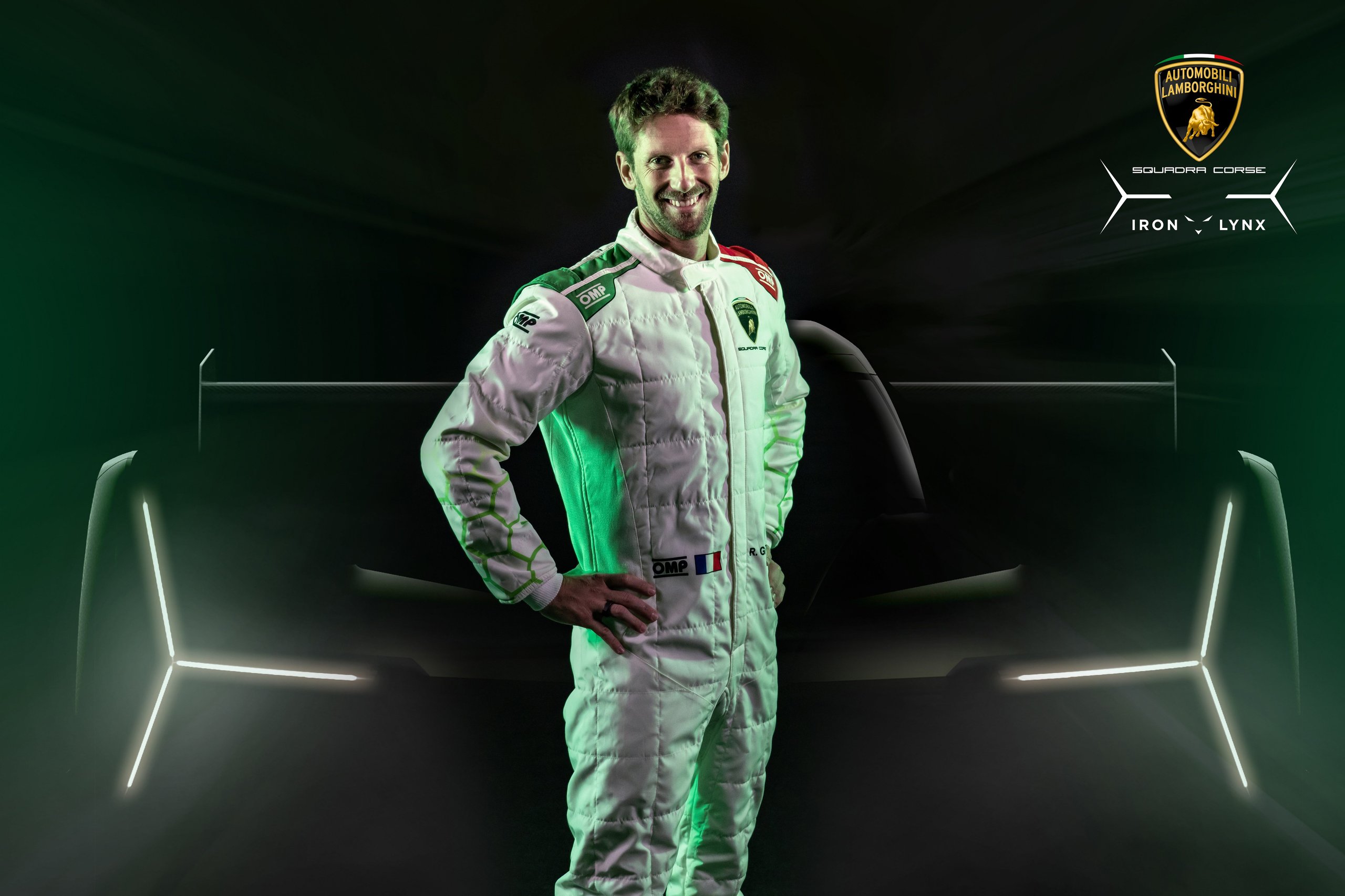 Why Lamborghini Hired An F1 Veteran To Build Its Hypercar Racing Future 5 Romain grosjean smiling confidently in lamborghini squadra corse racing suit with sc63 in background